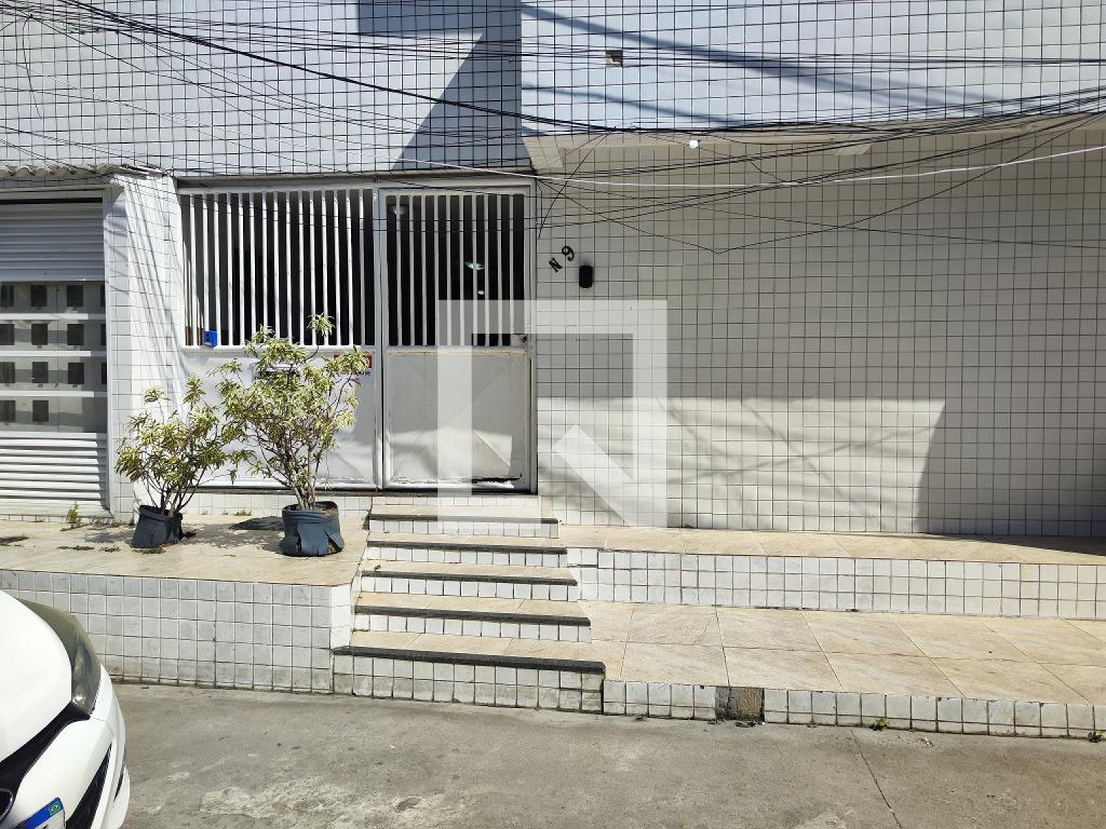 Fachada Condomínio em Rua dos Crisântemos, 9