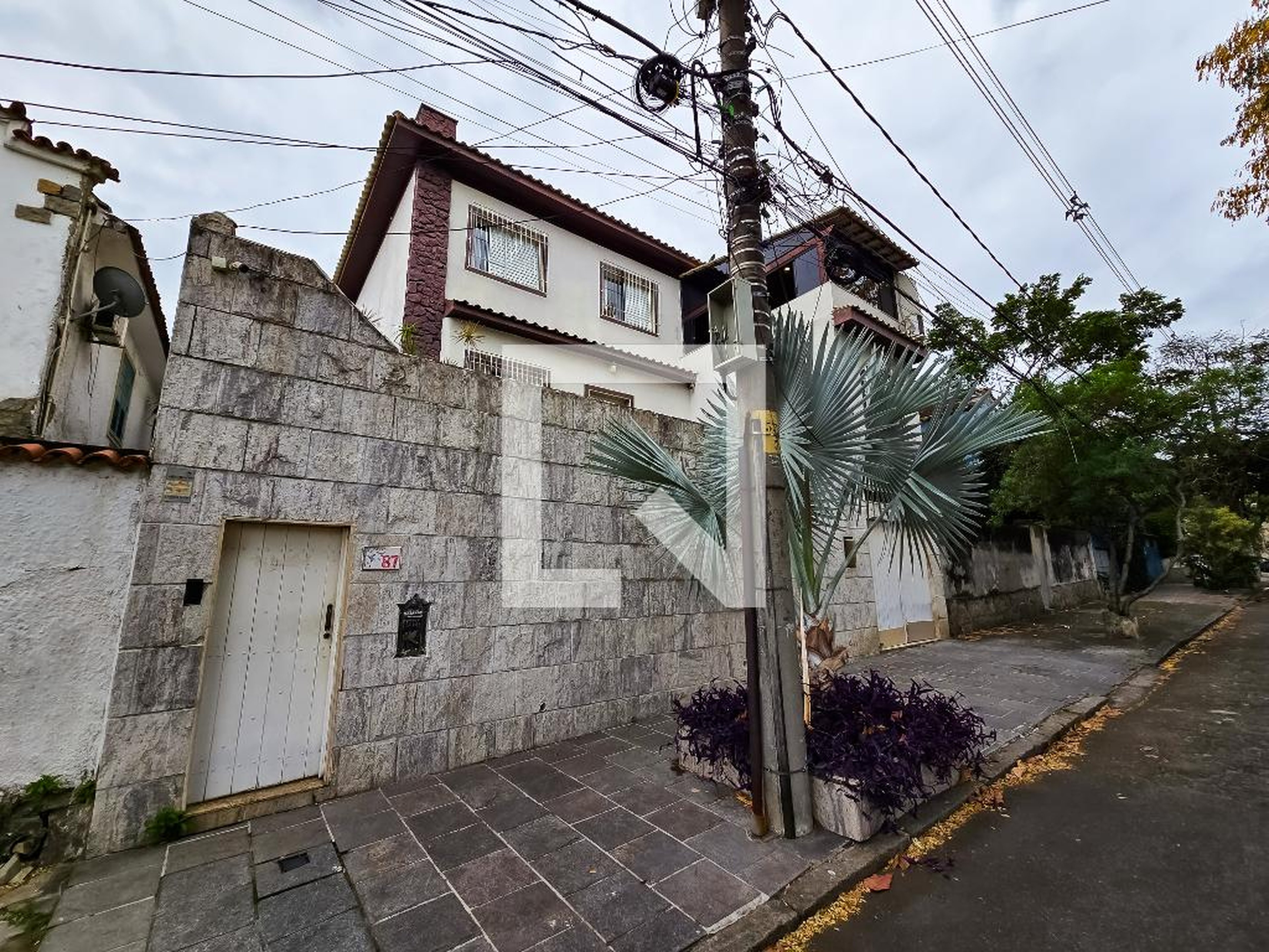 Fachada Condomínio em Rua Enéas Campelo, 87