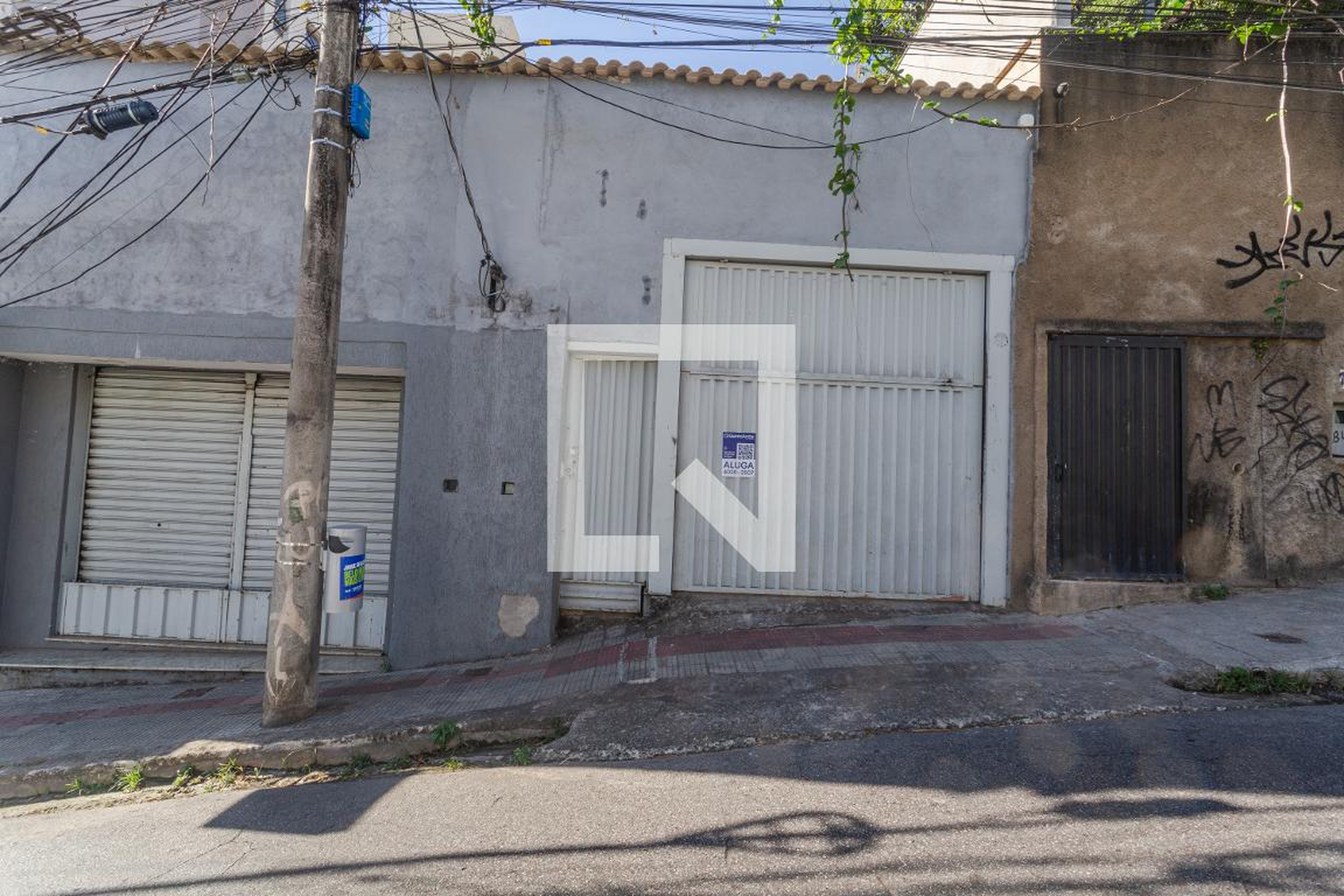 Fachada Condomínio em Rua Pitangui, 1843