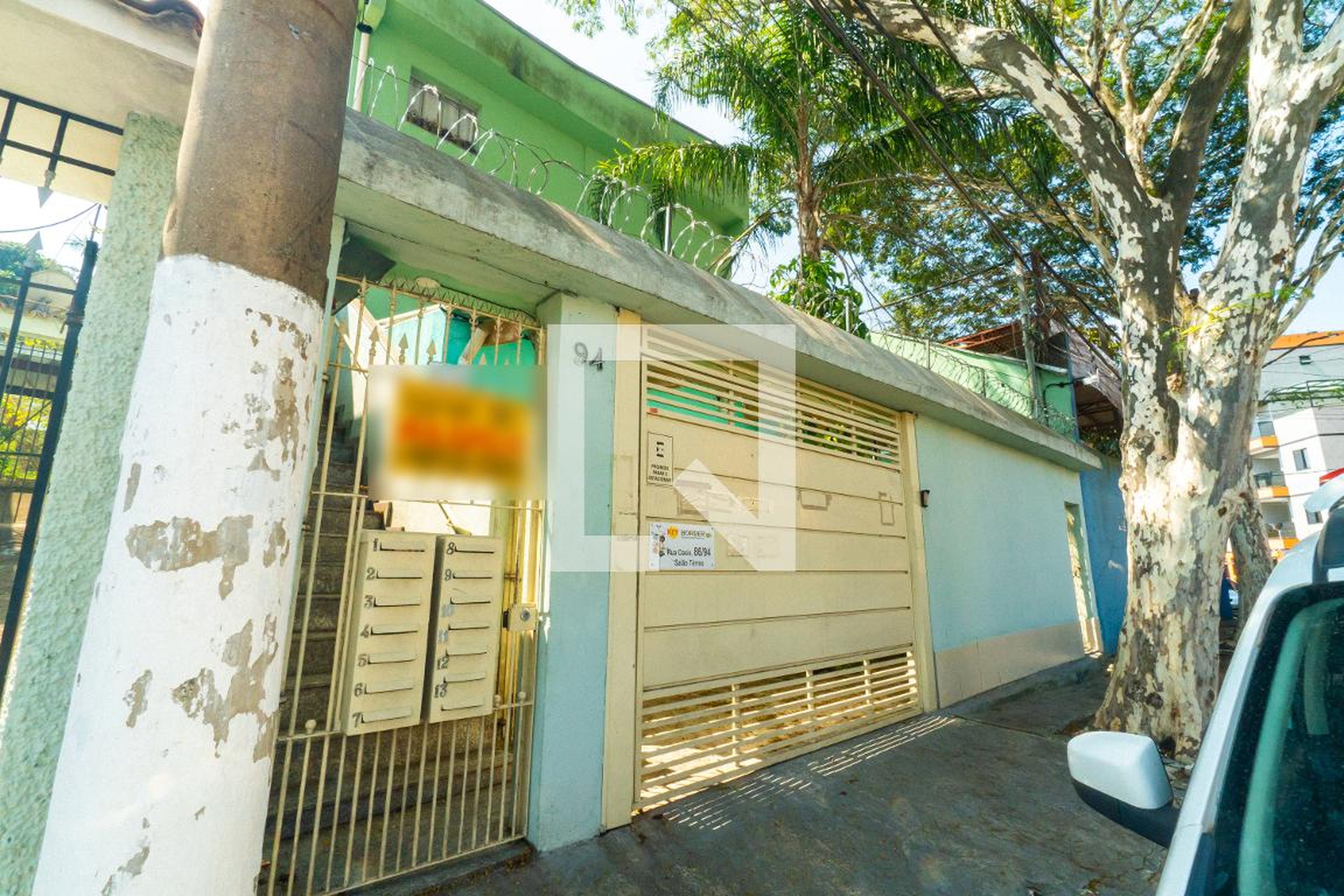 Fachada Condomínio em Rua Oásis, 94