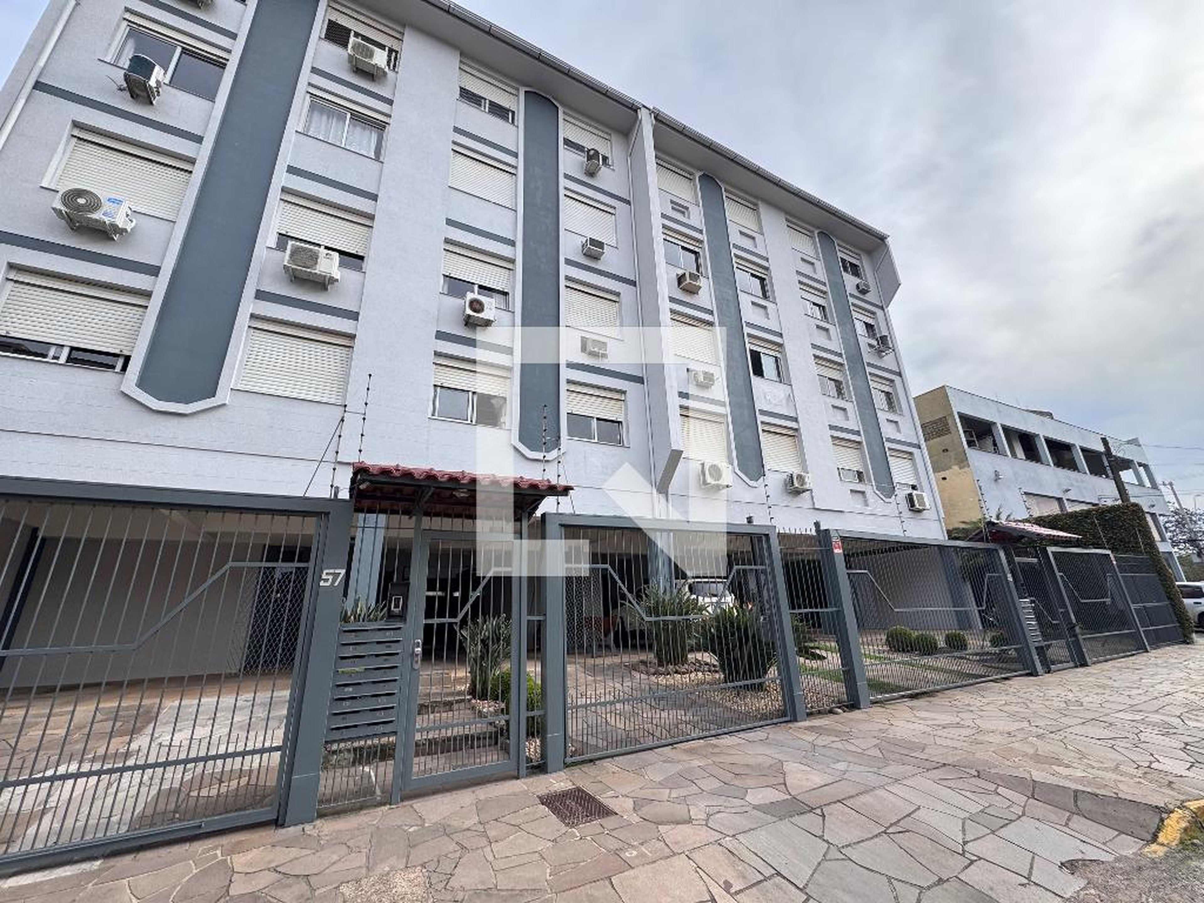 Fachada Condomínio em Rua Casemiro de Abreu, 57