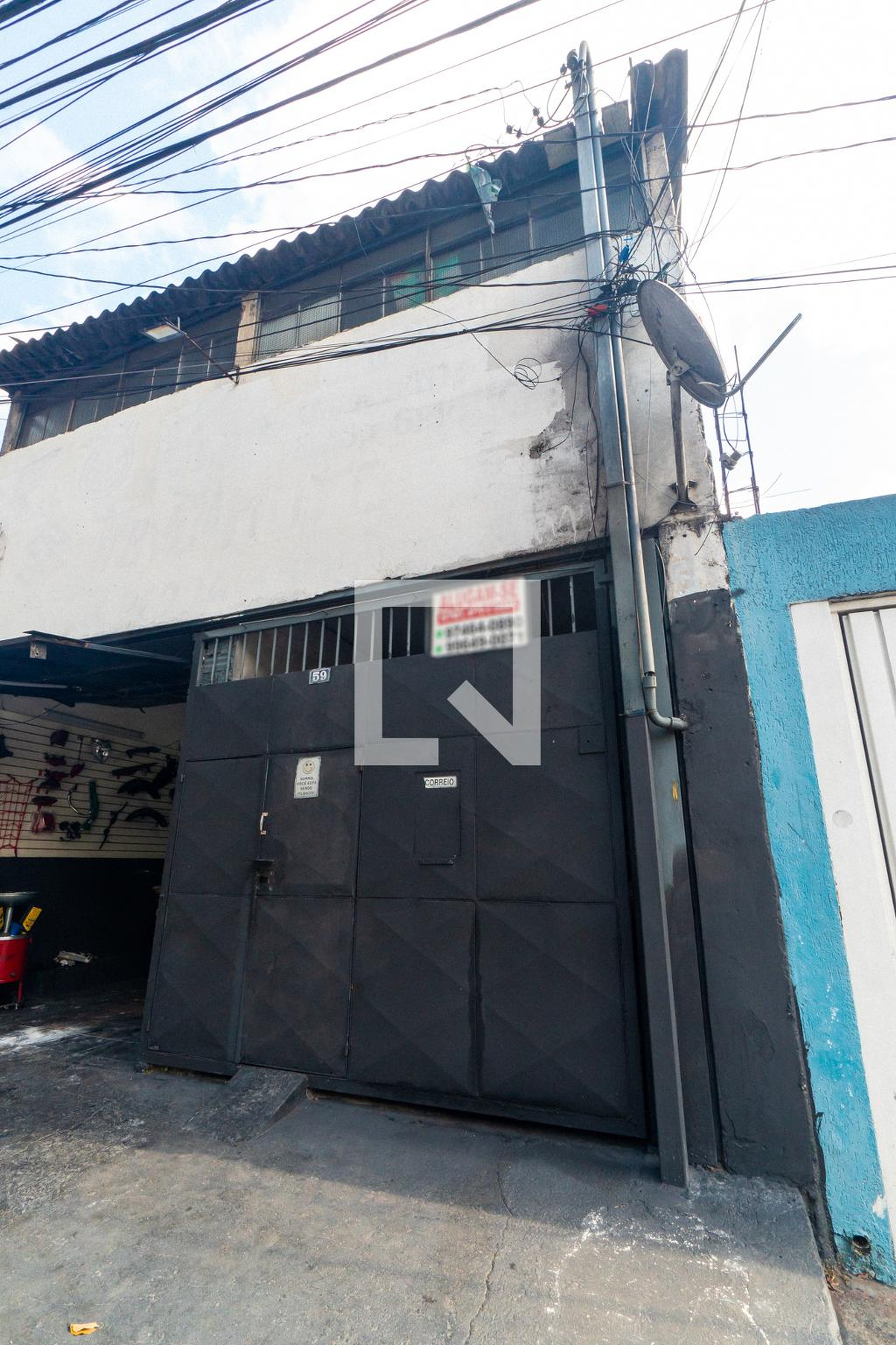 Fachada Condomínio em Rua das Corruiras, 59