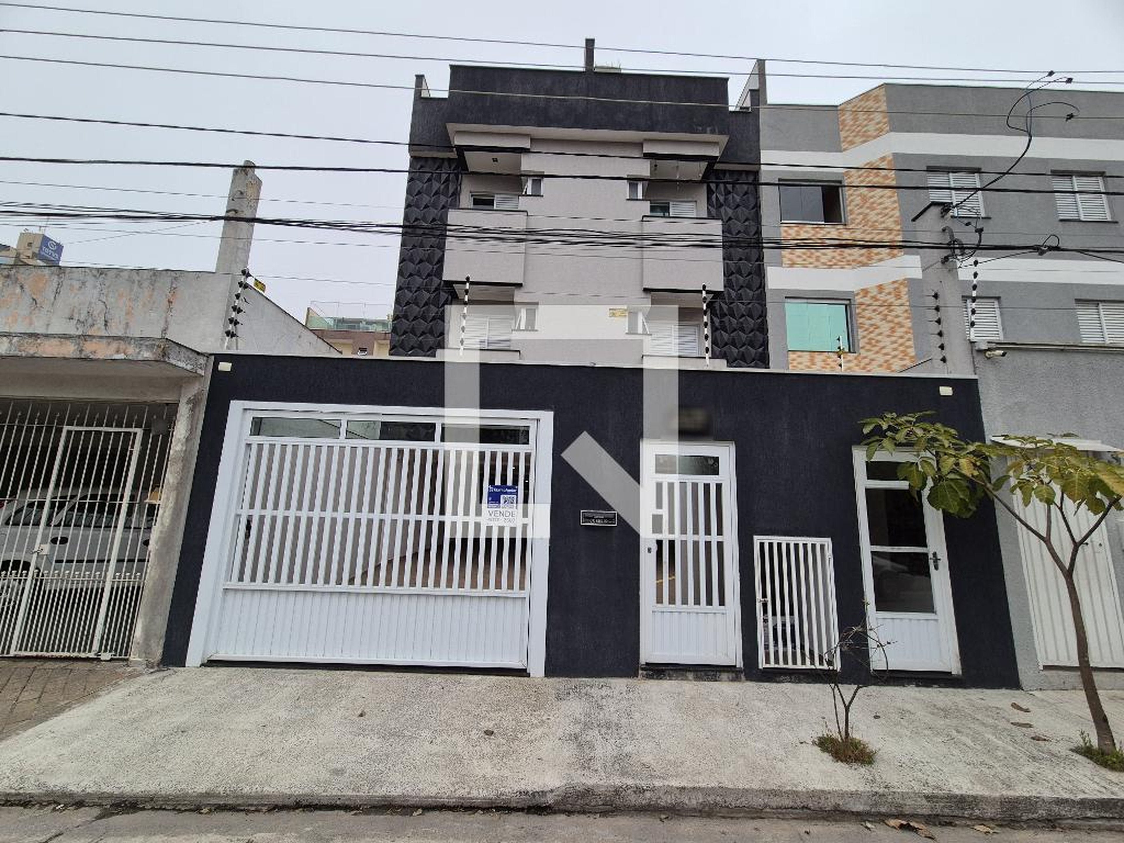 Fachada Condomínio em Rua Parecis, 27