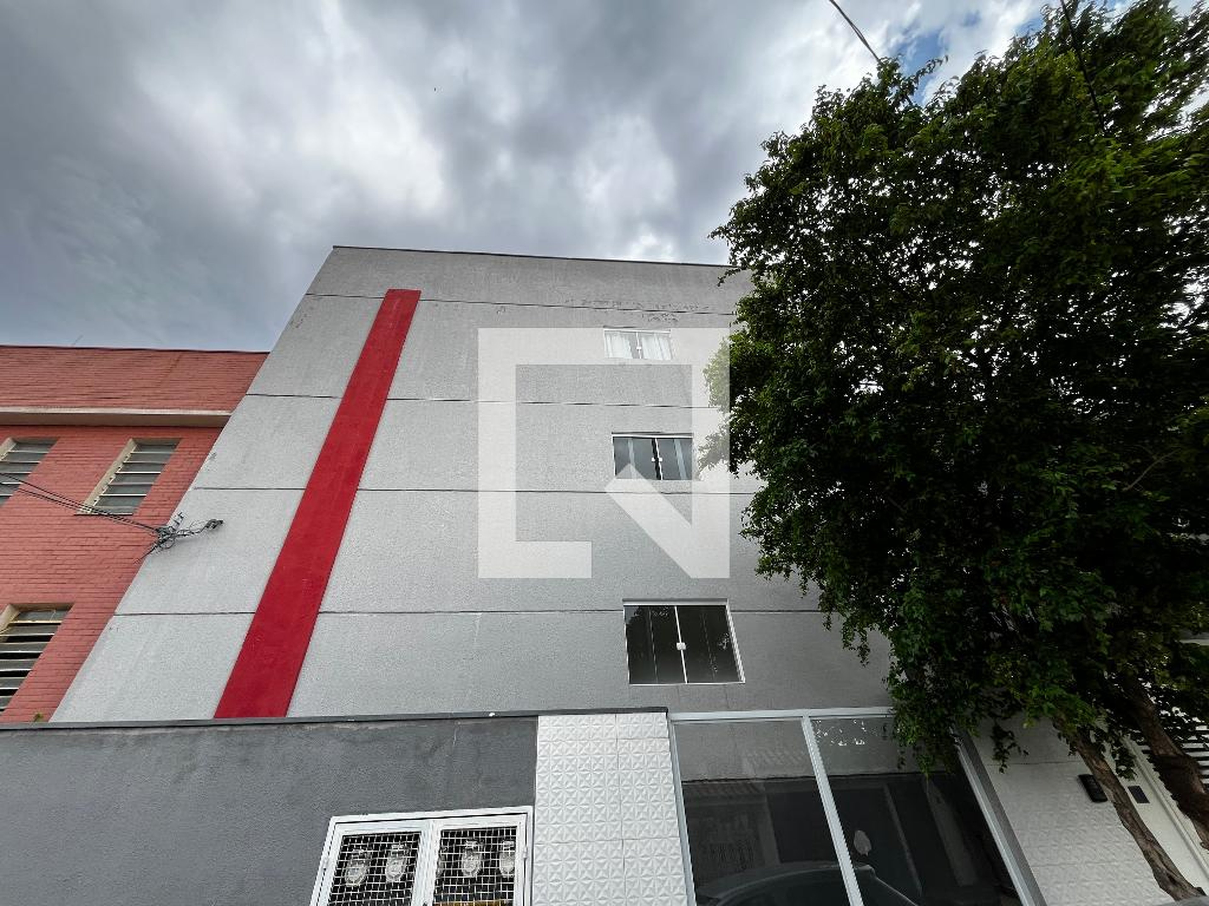 Fachada Condomínio em Rua Assuero Roque, 191