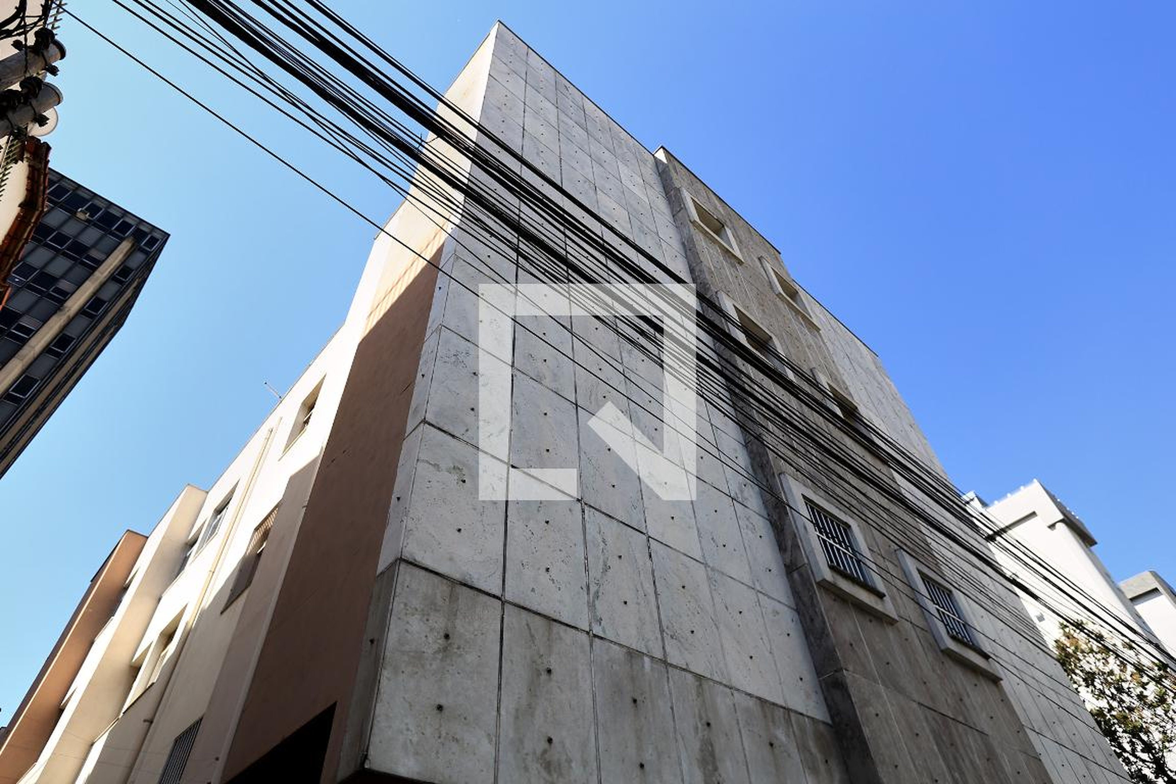 Fachada Condomínio em Rua Tenente Garro, 49