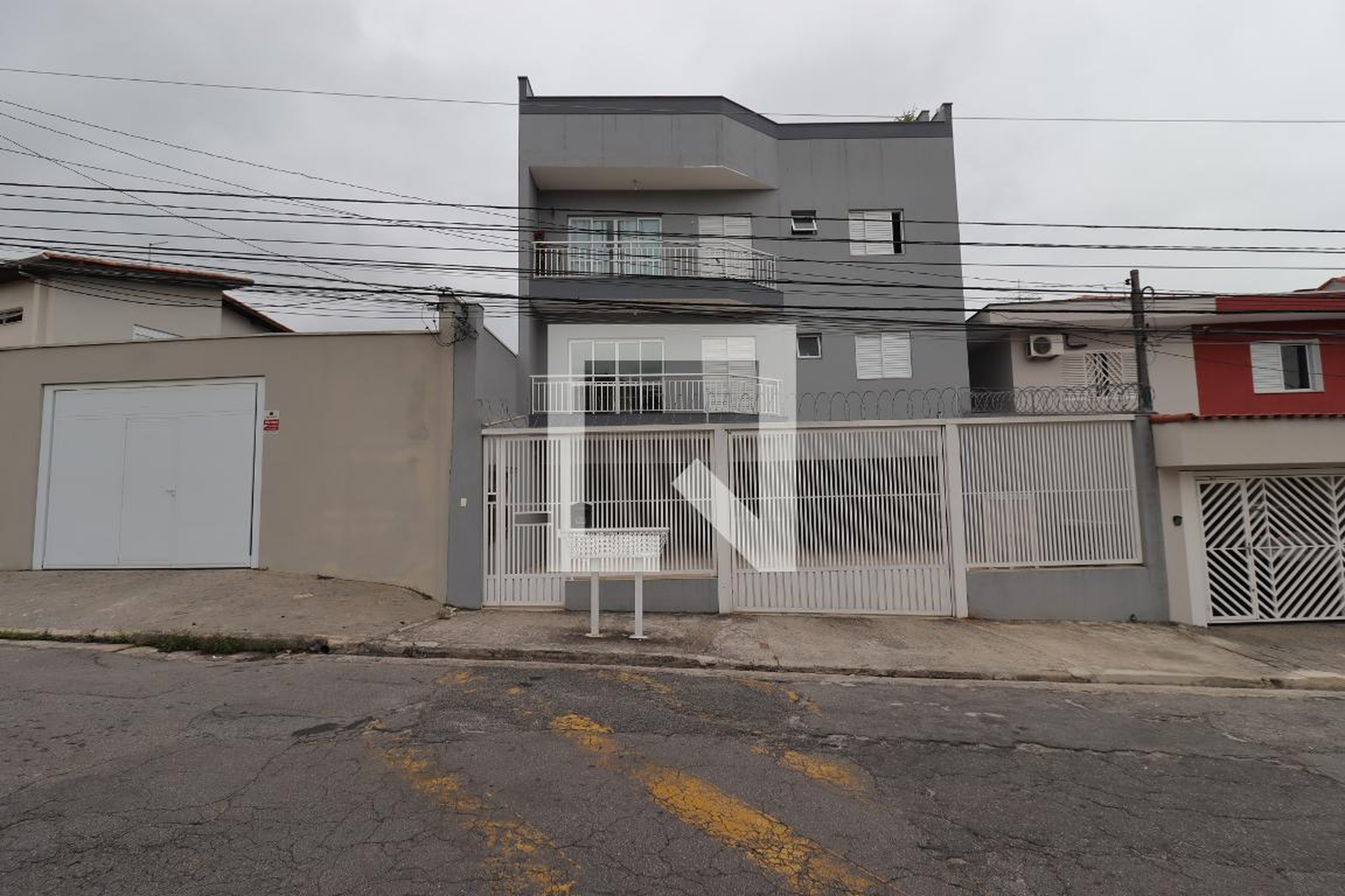 Fachada Condomínio em Rua Rocha Pombo, 168