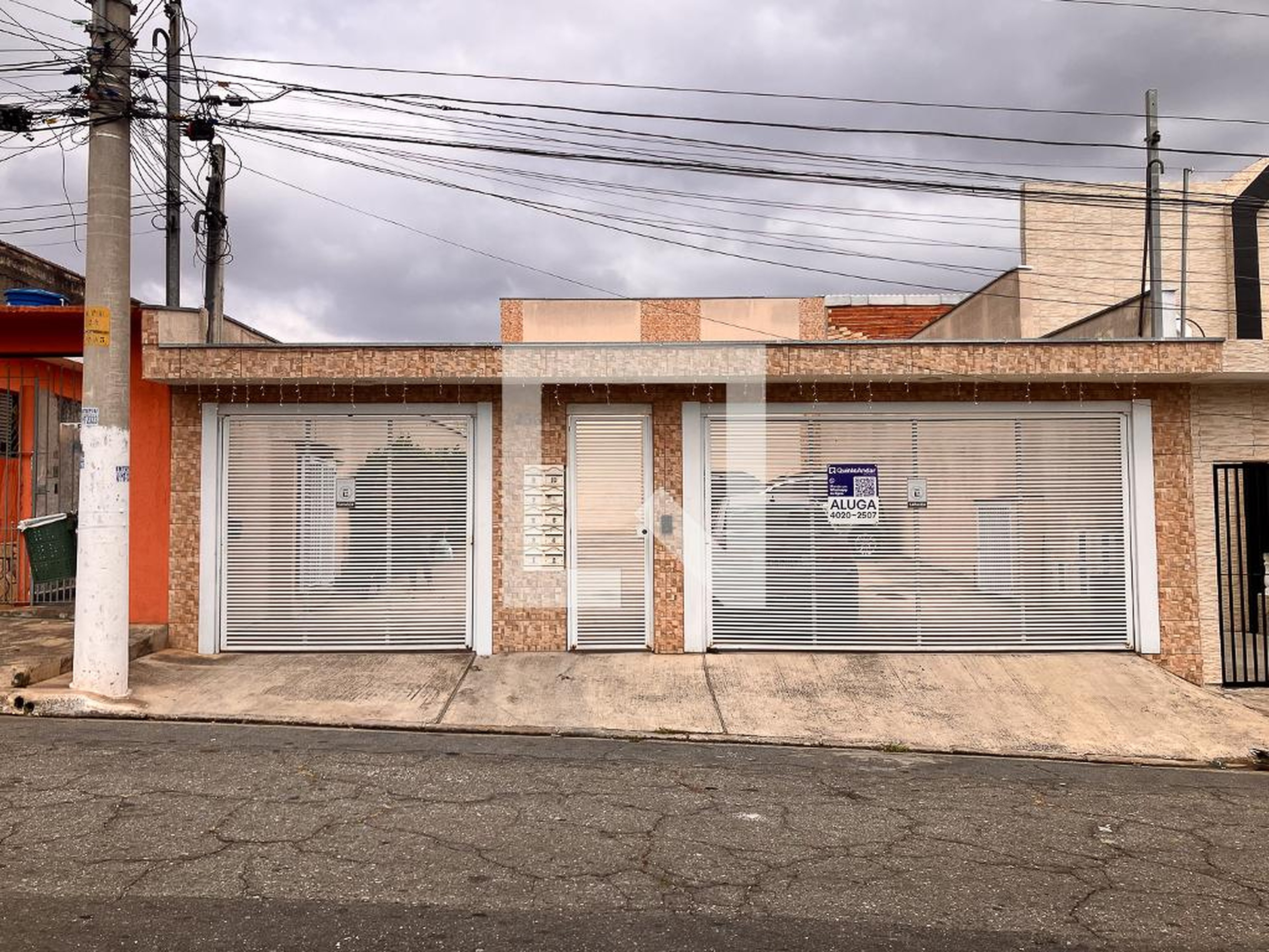 Fachada Condomínio em Rua Júlio Parigot, 236