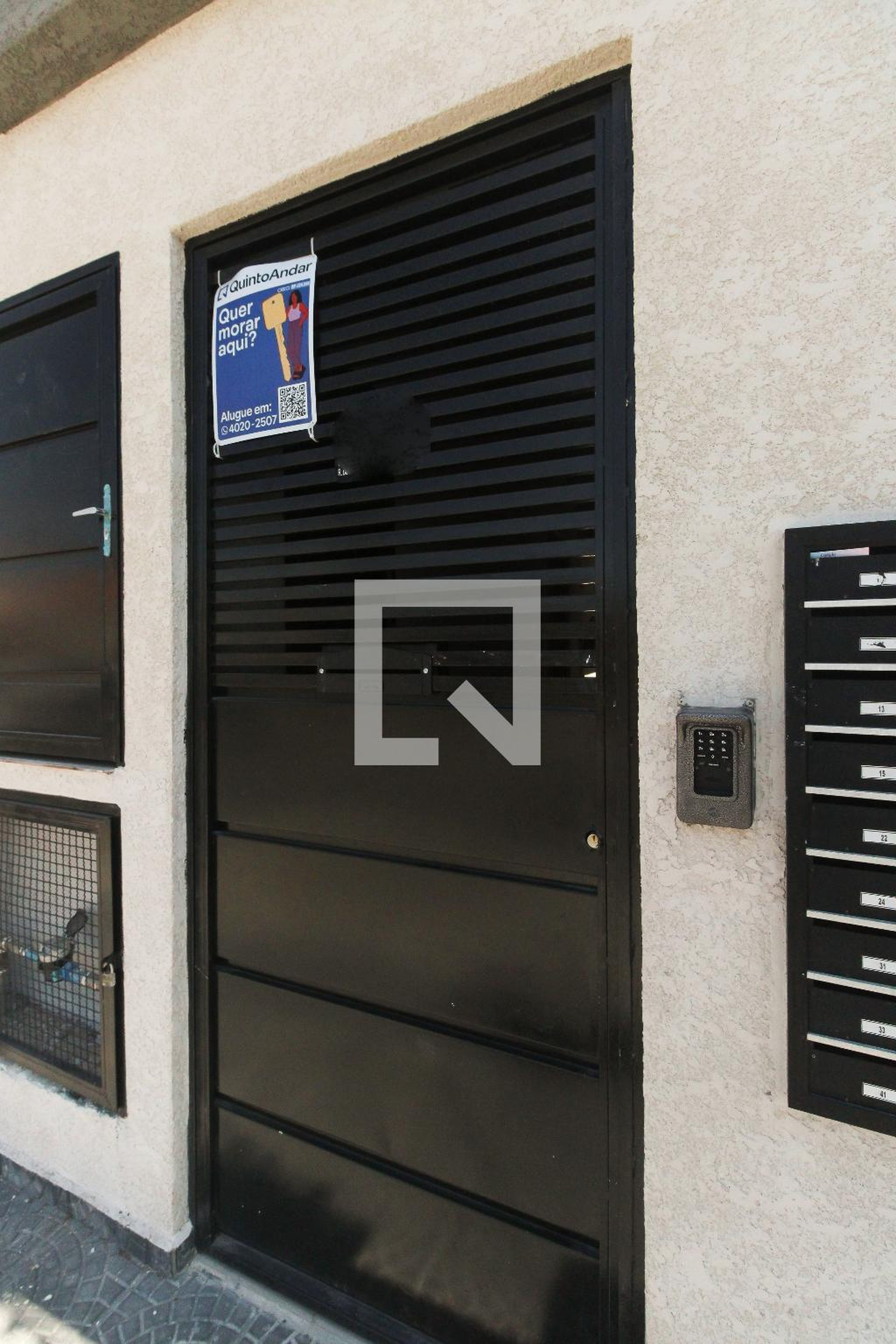 Fachada Condomínio em Rua Dona Escolástica Melchert da Fonseca, 1166