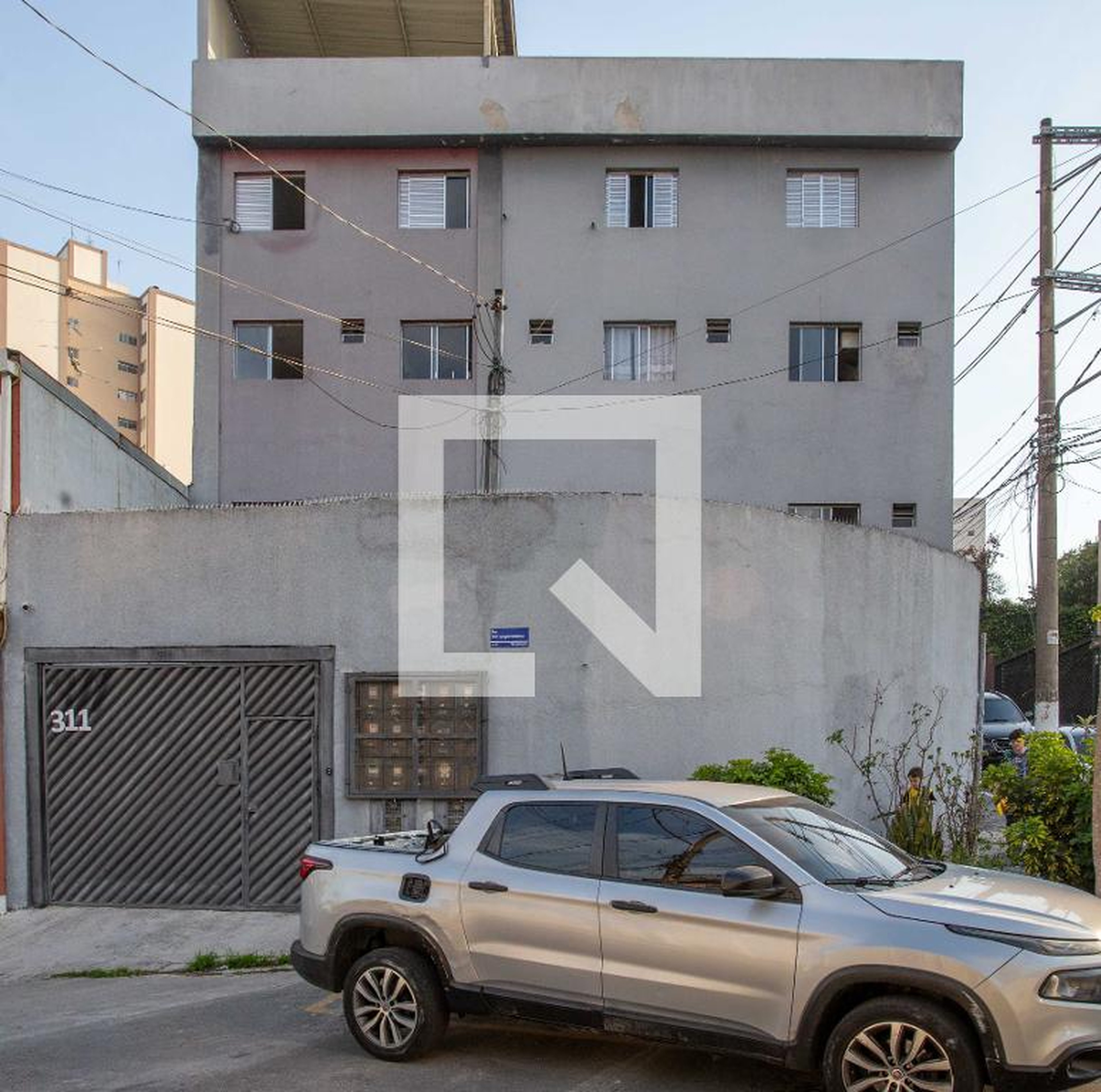 Fachada Condomínio em Rua Ida Espagiari Martins, 311