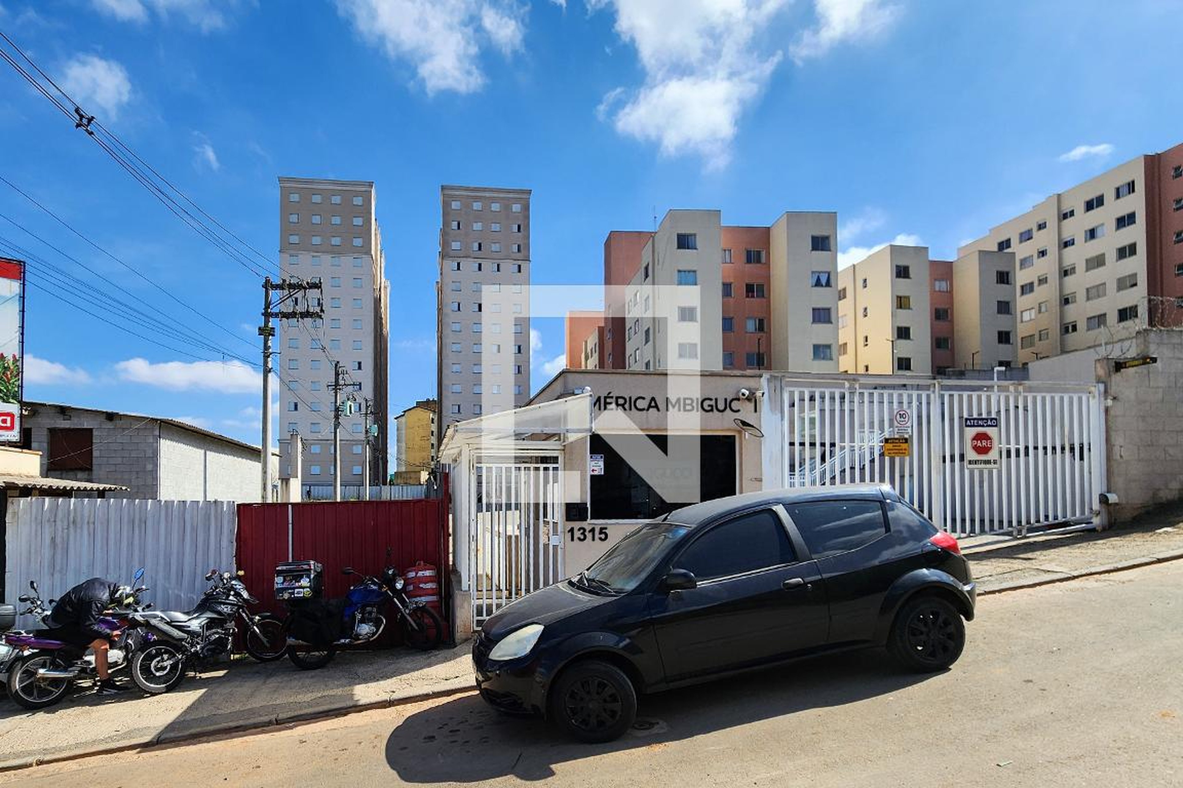 Fachada do Condomínio Condomínio América MBIGUCCI