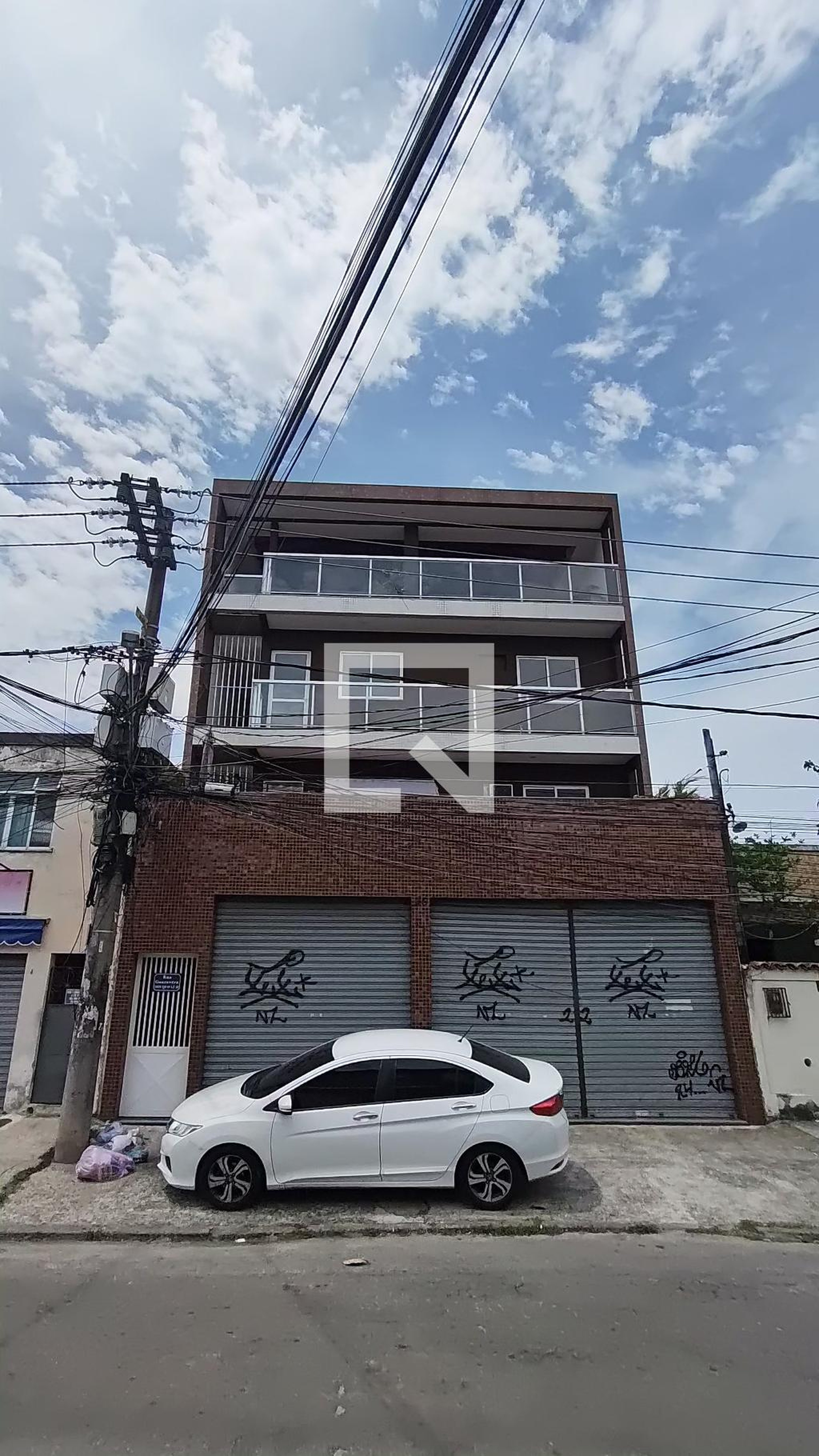 Fachada Condomínio em Rua Guaravera, 26