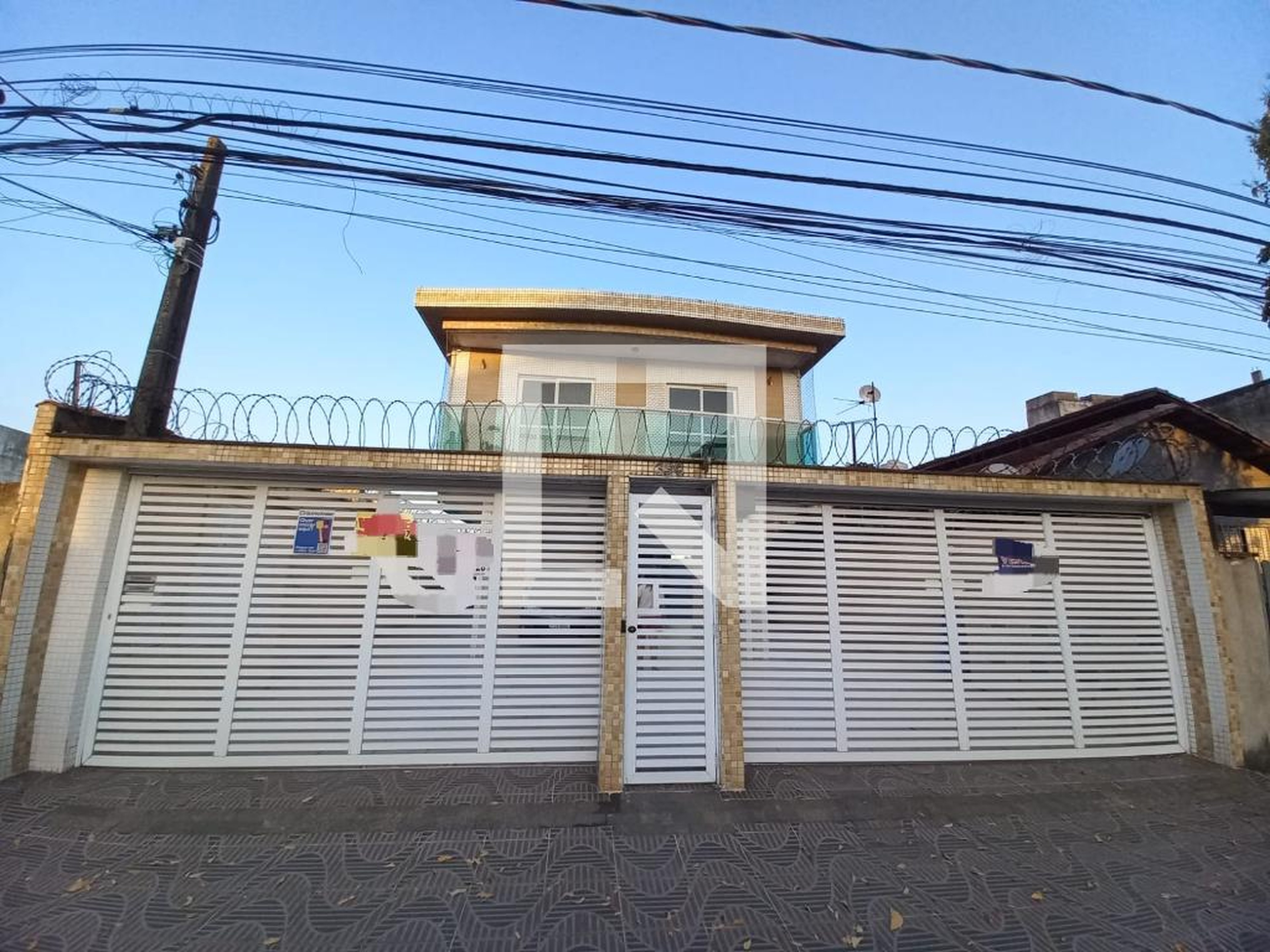 Fachada Condomínio em Rua Bento Viana, 396