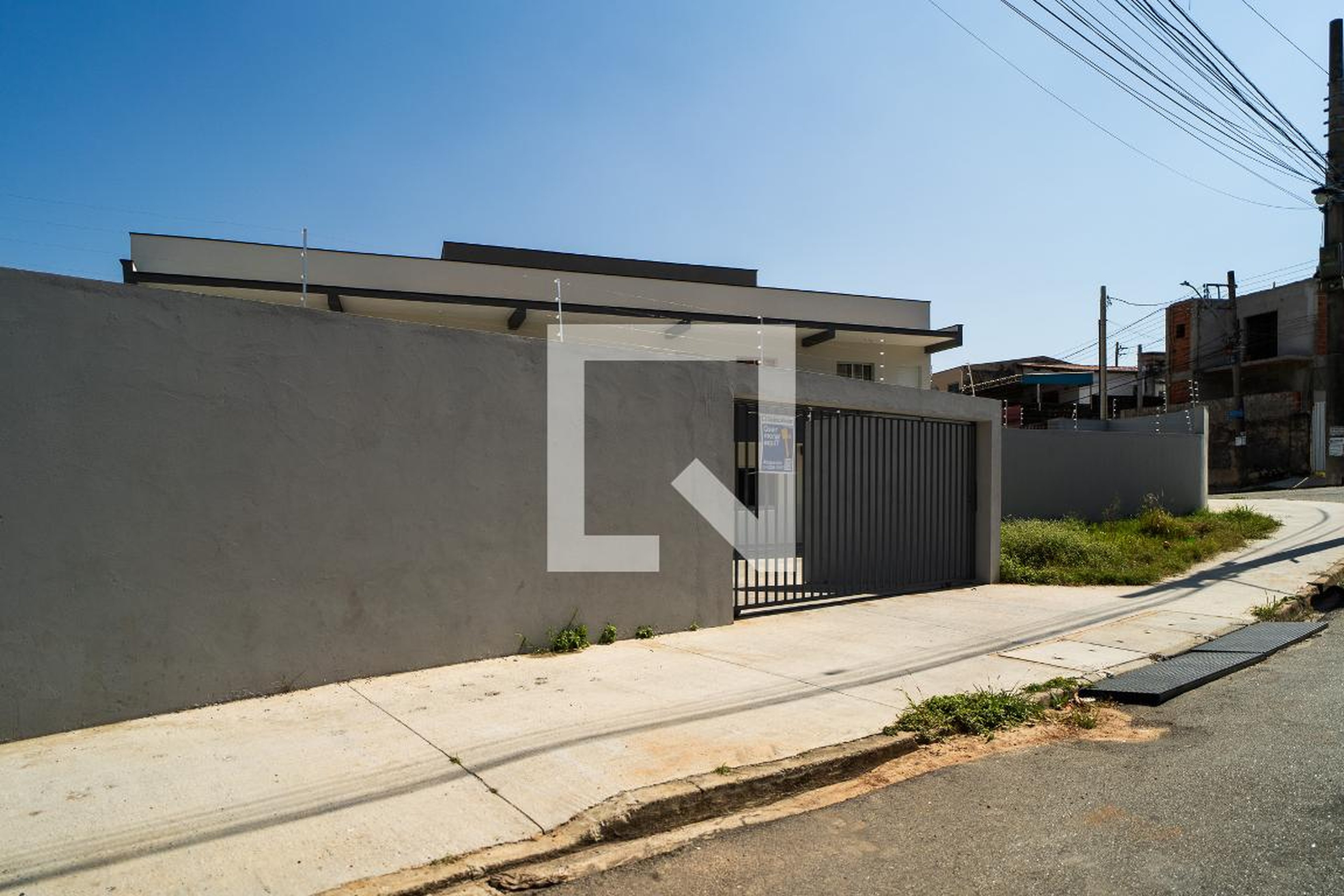 Fachada Condomínio em Rua Décio Menzel Pachêco, 11