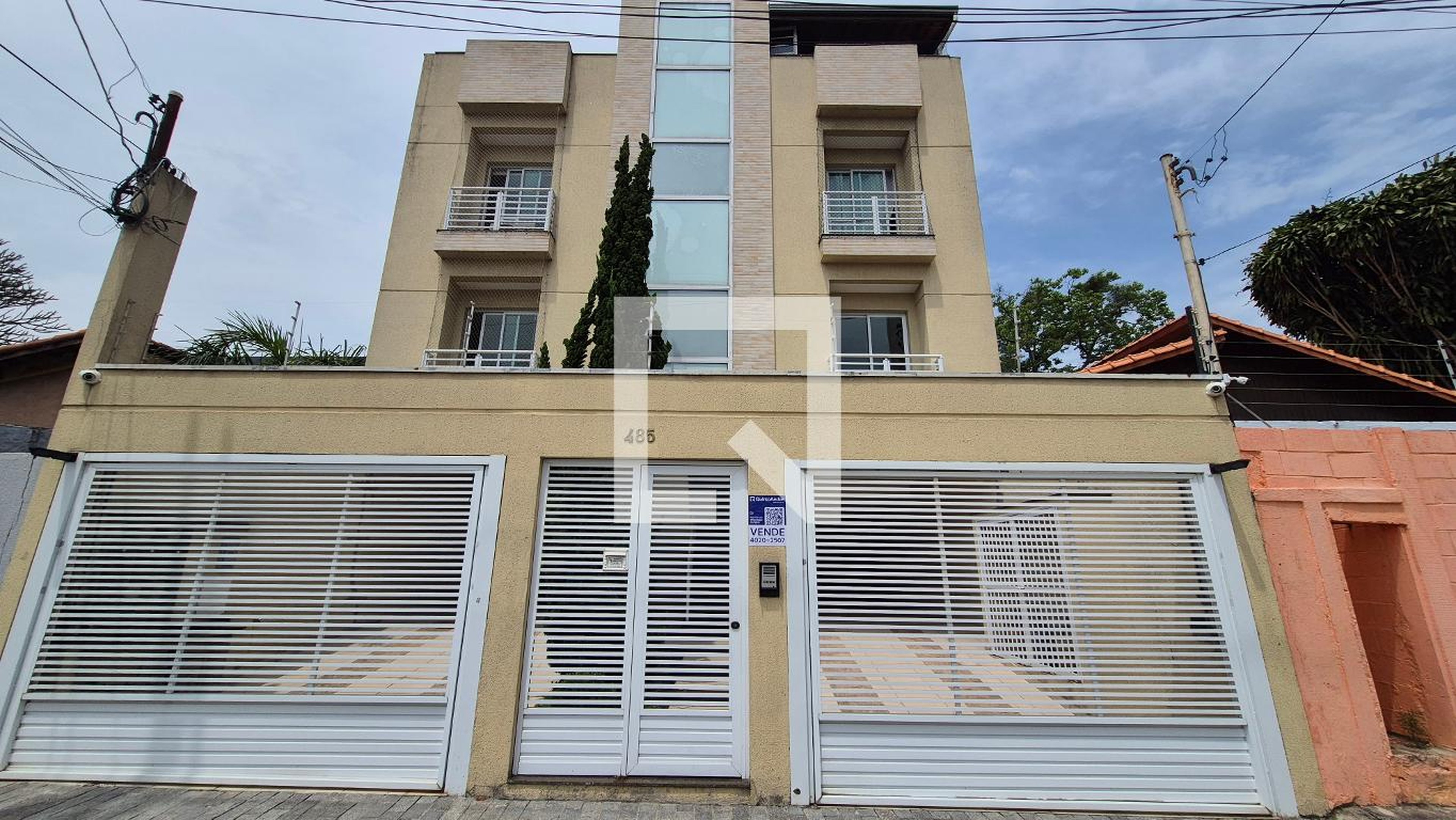 Fachada Condomínio em Rua Andarai, 485