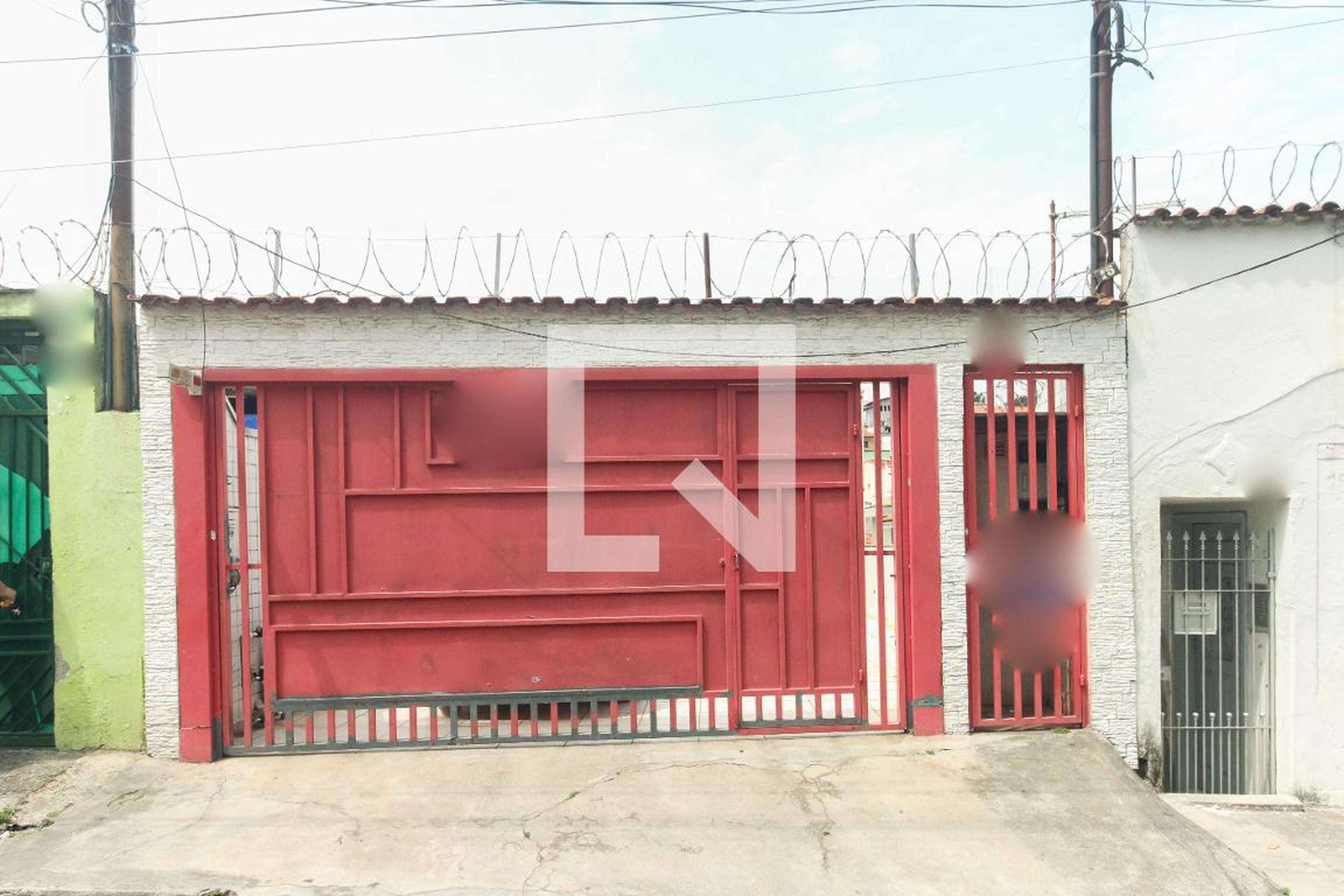 Fachada Condomínio em Rua Raul de Freitas, 117