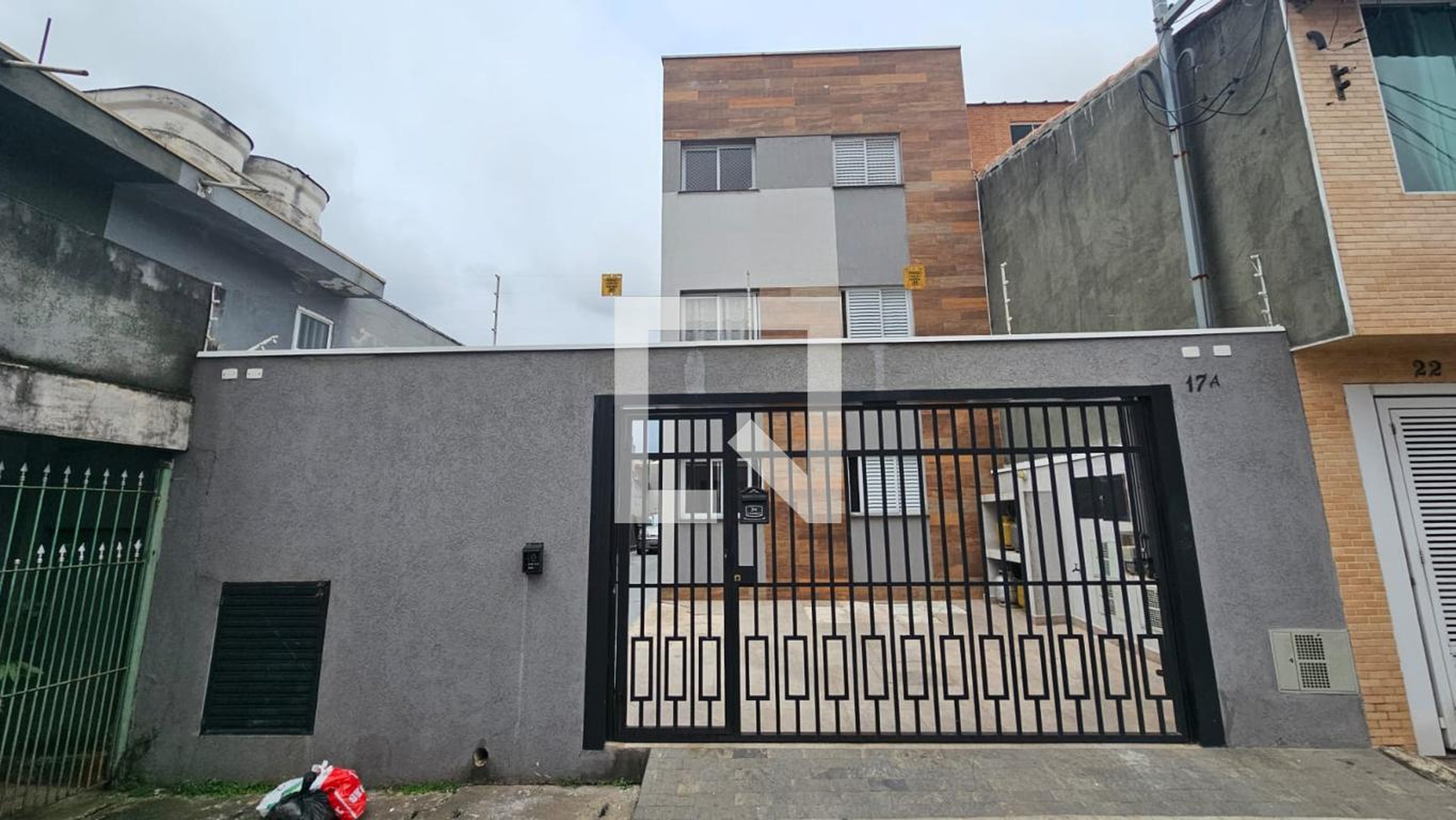 Fachada Condomínio em Rua Ibiraci, 17