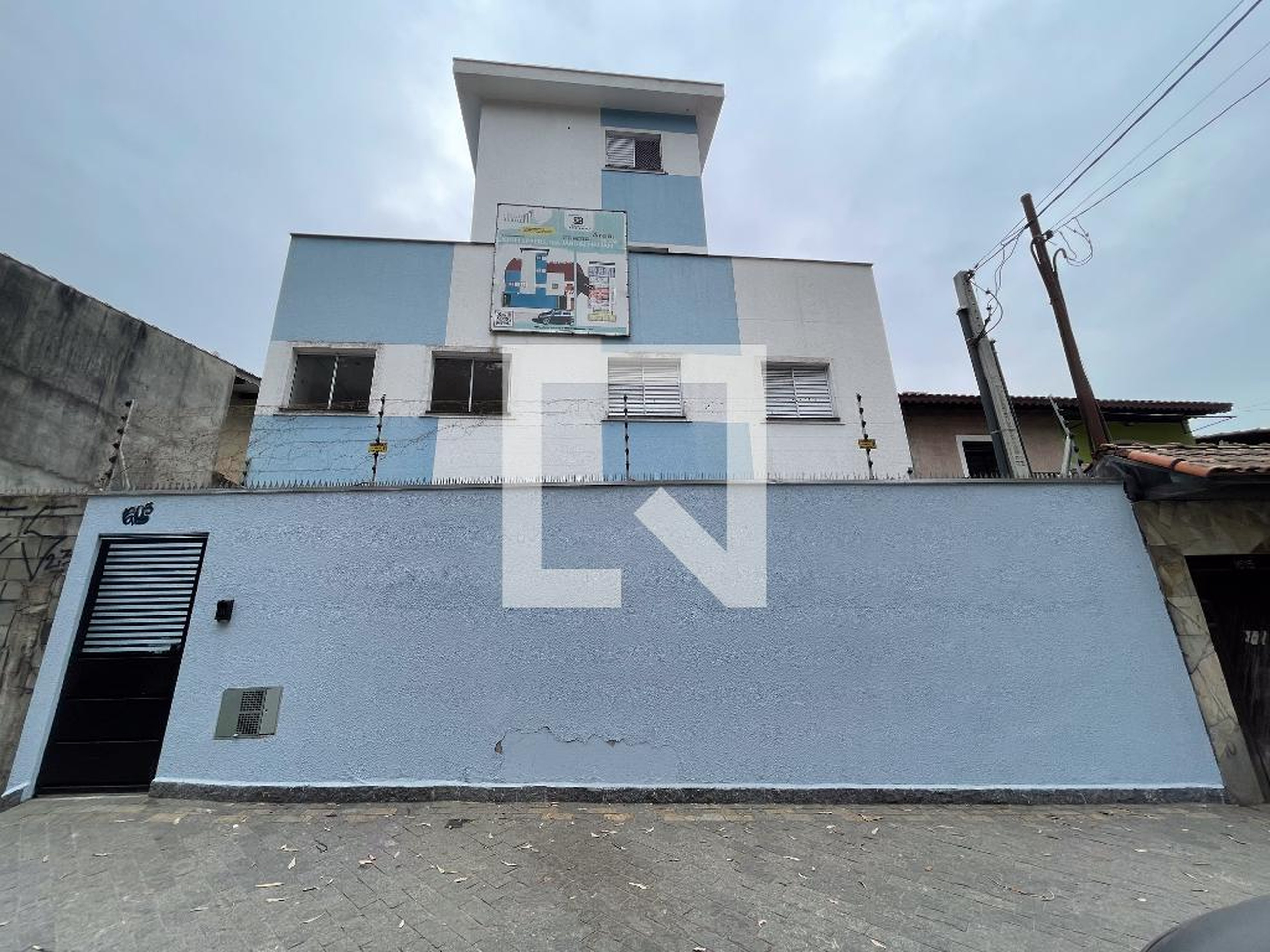 Fachada Condomínio em Rua John Speers, 1605