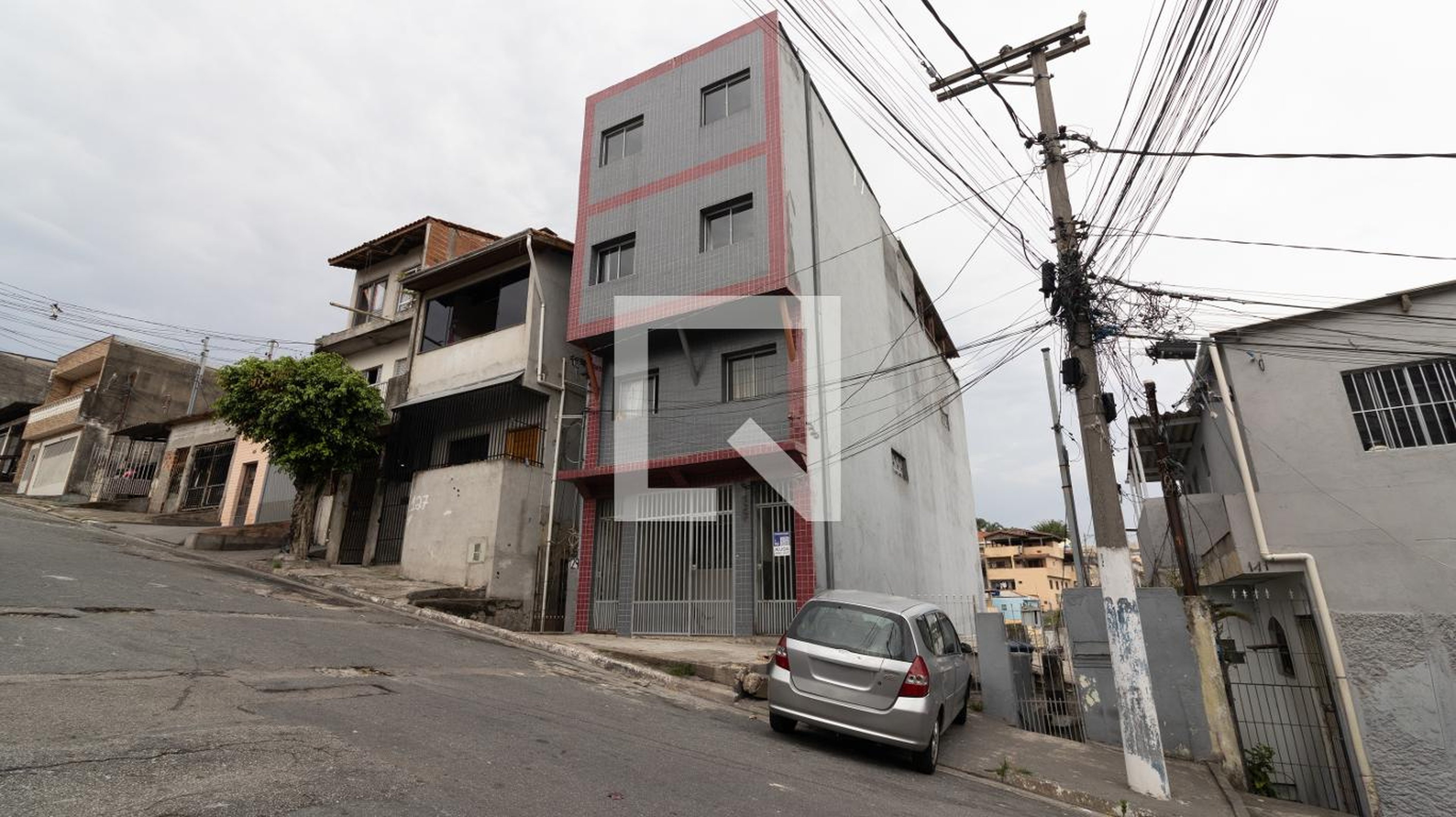 Fachada Condomínio em Rua Maestro Vasconcelos Chaves, 133