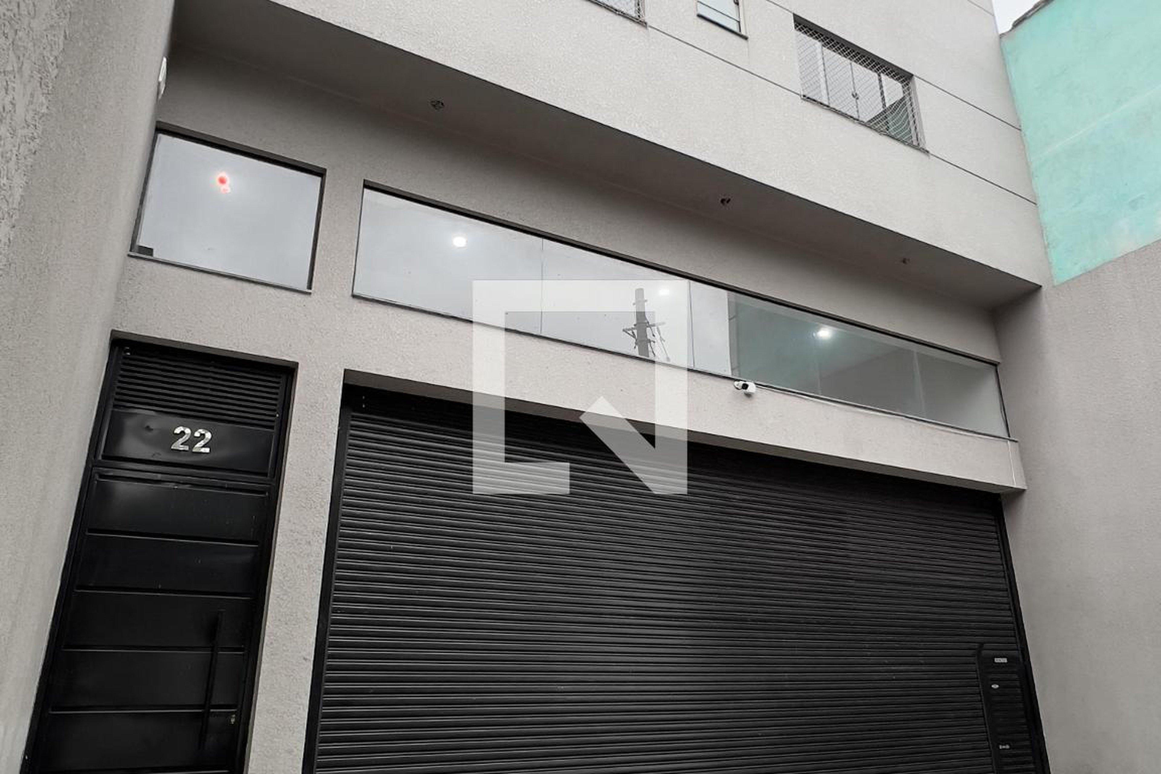 Fachada Condomínio em Rua Ésio Padilha de Oliveira, 22