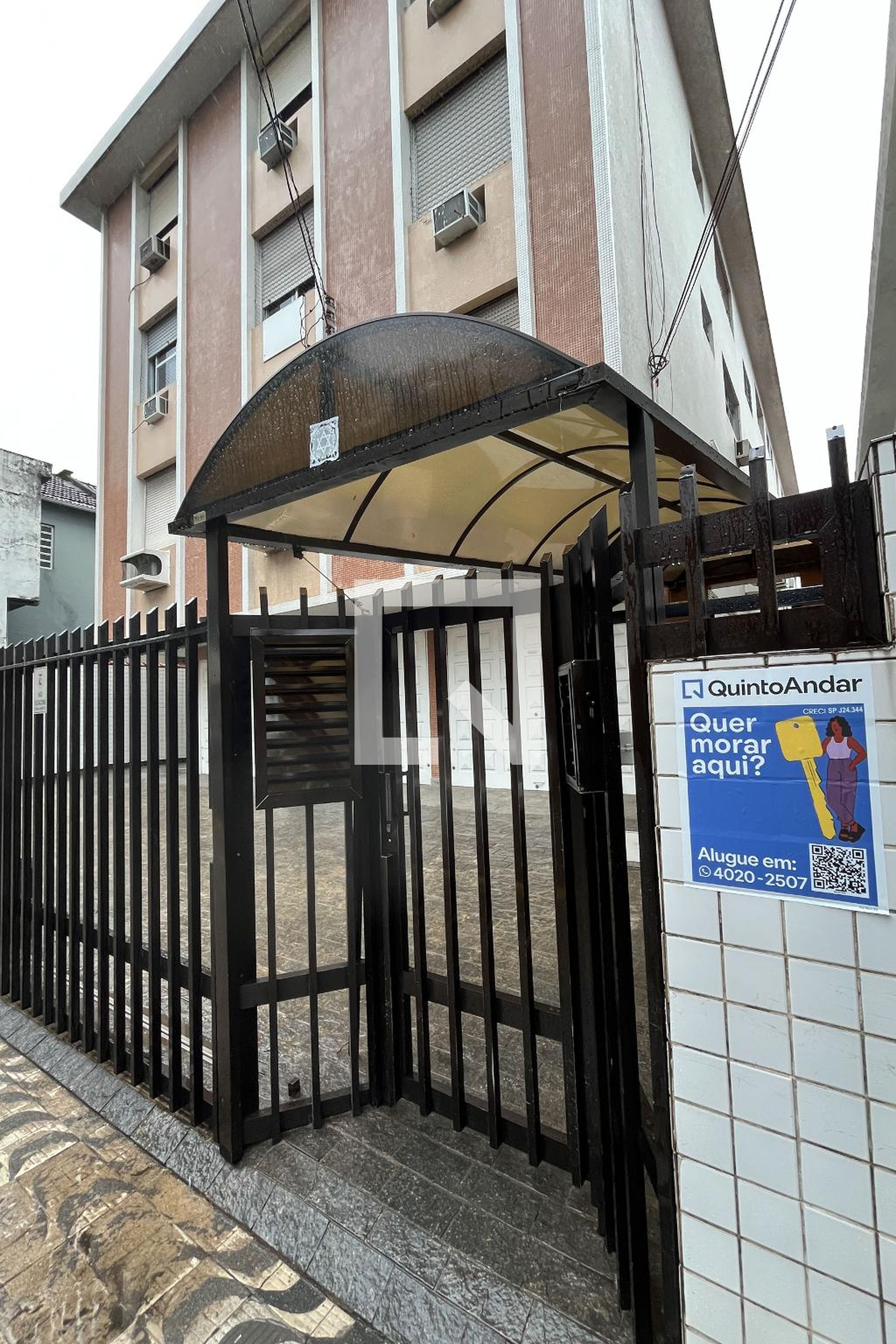 Fachada Condomínio em Rua Carlos Gomes, 215