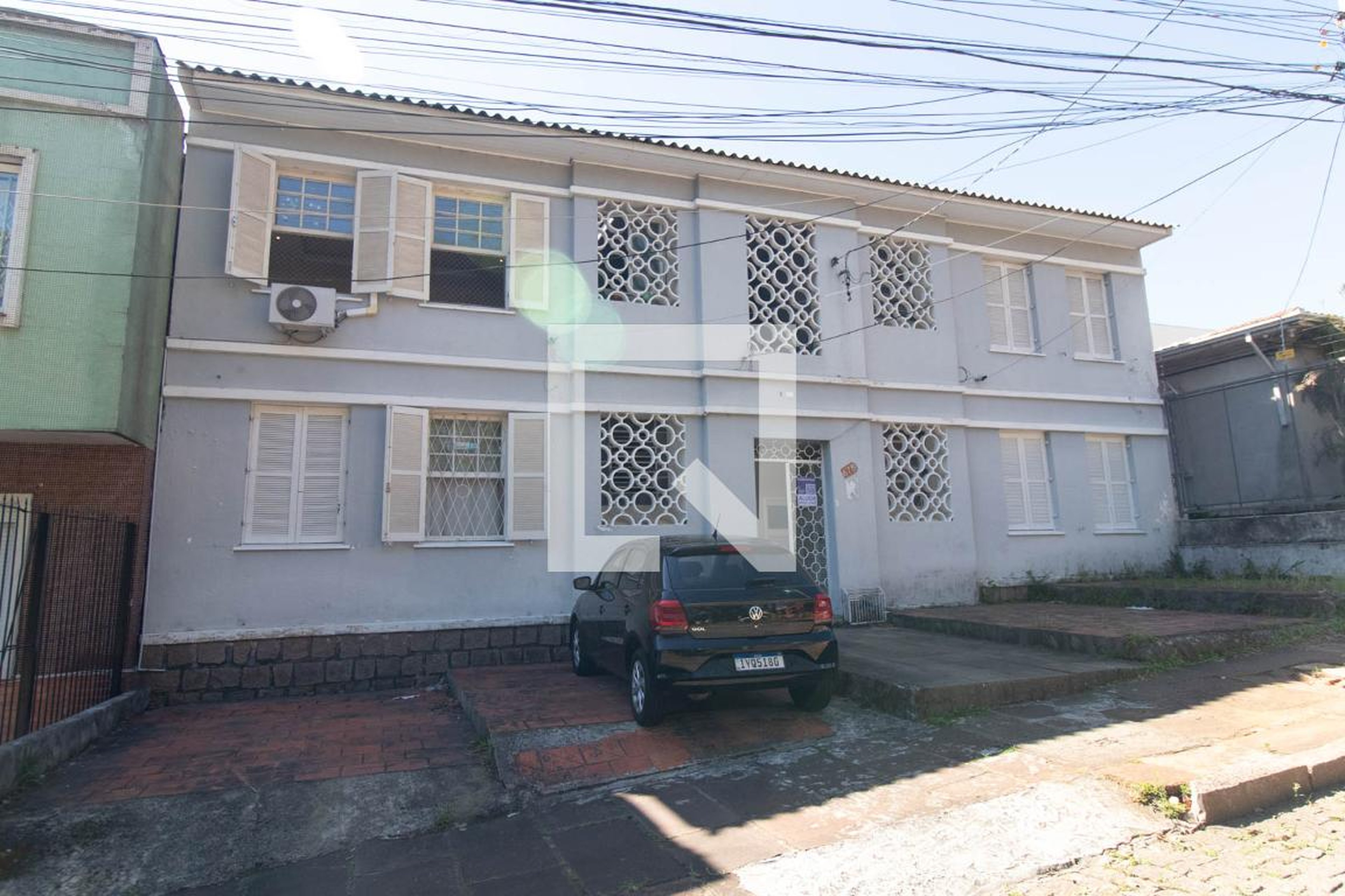 Fachada Condomínio em Rua Doutor Voltaire Pires, 678