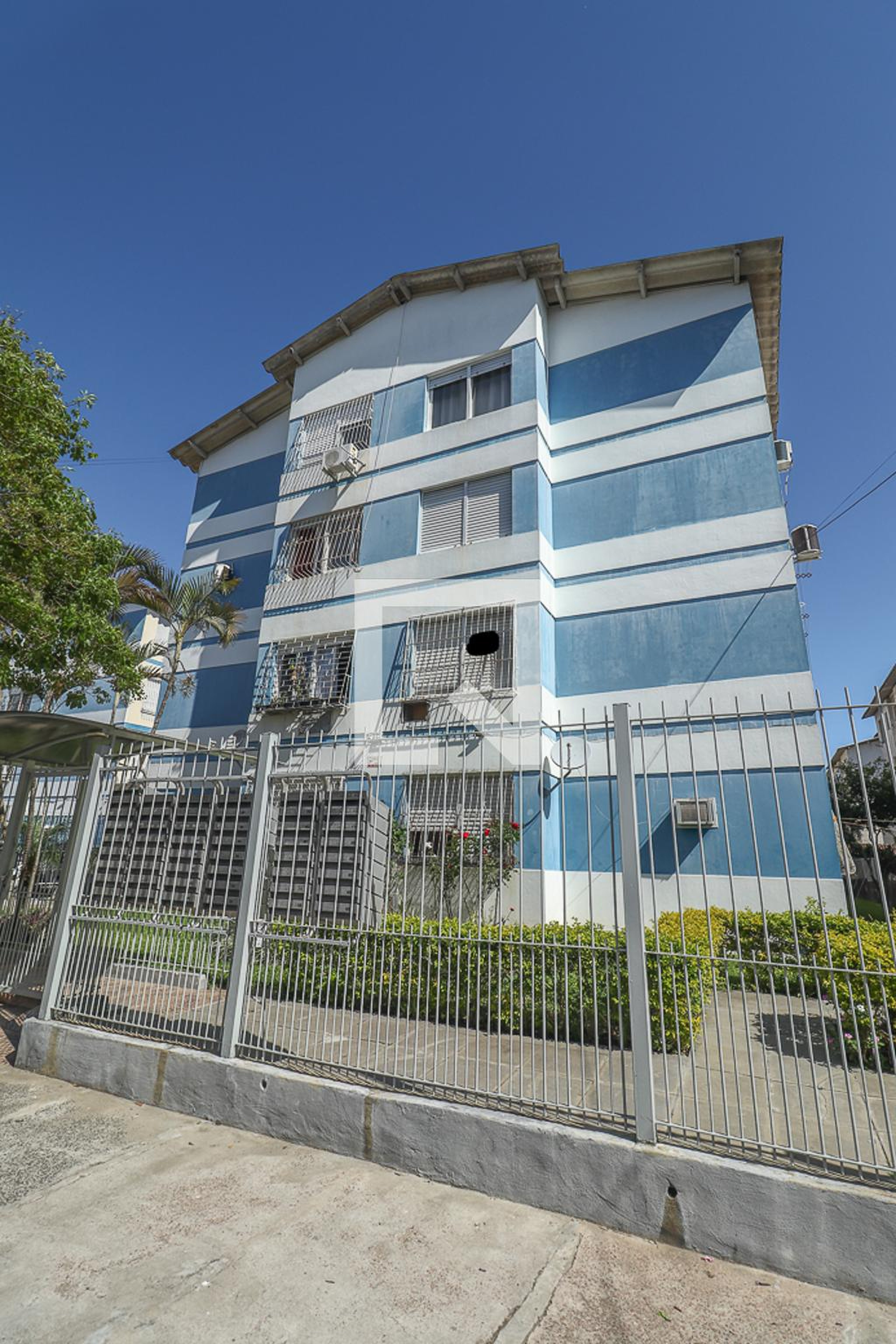 Fachada Condomínio em Rua Carlos Estevão, 380