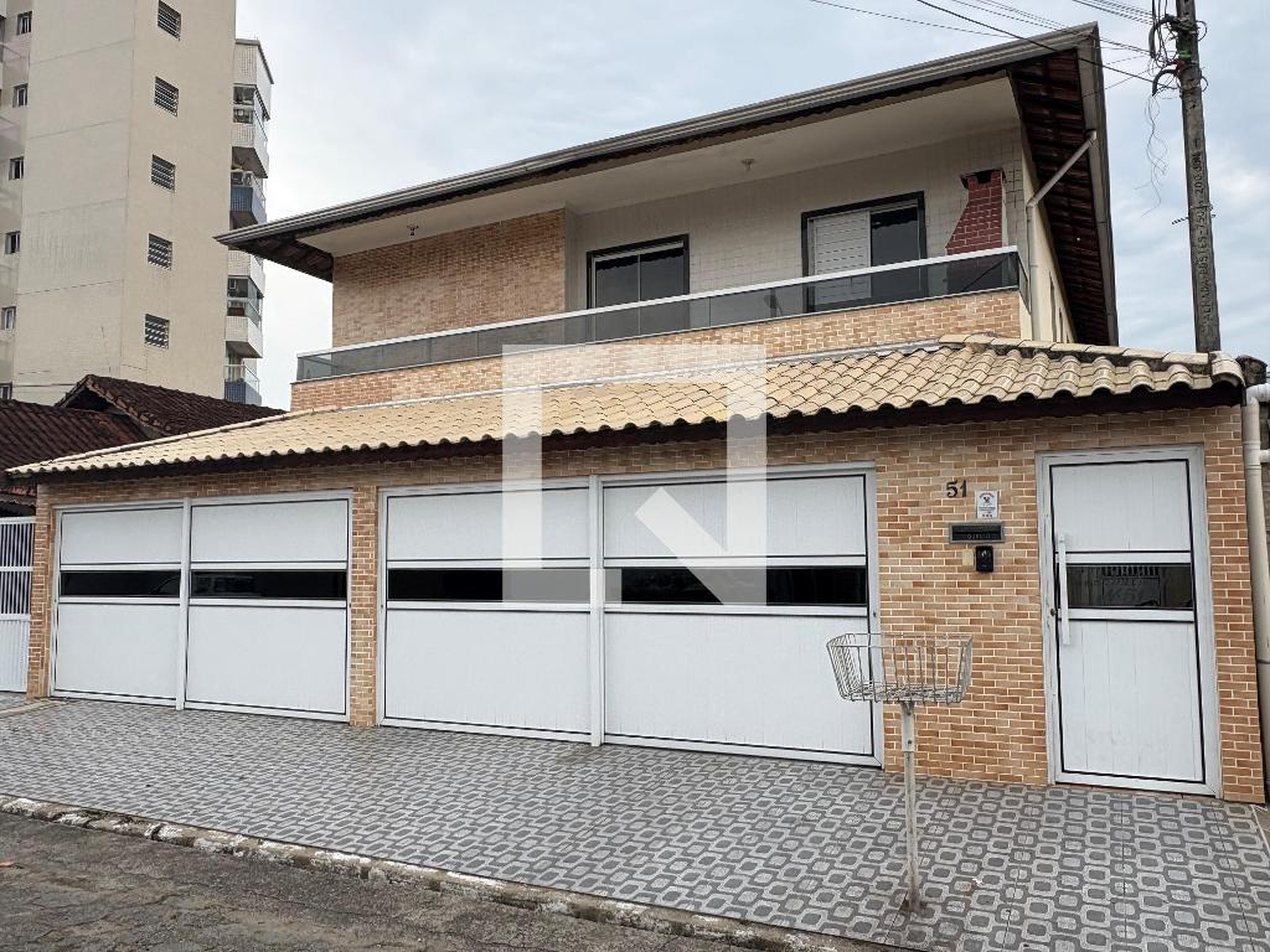 Fachada Condomínio em Rua Juriti, 51