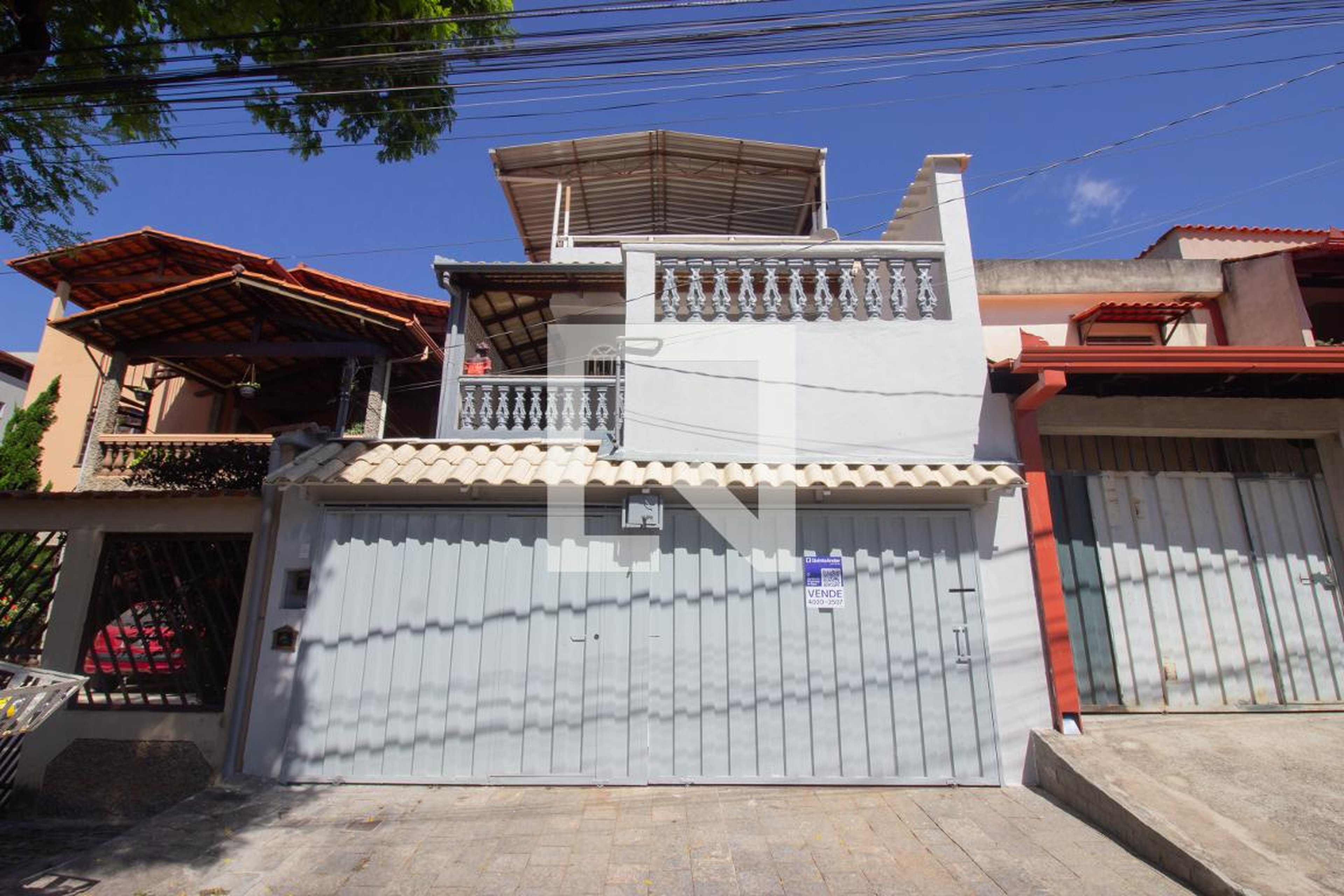 Fachada Condomínio em Rua Vinte e Seis, 126