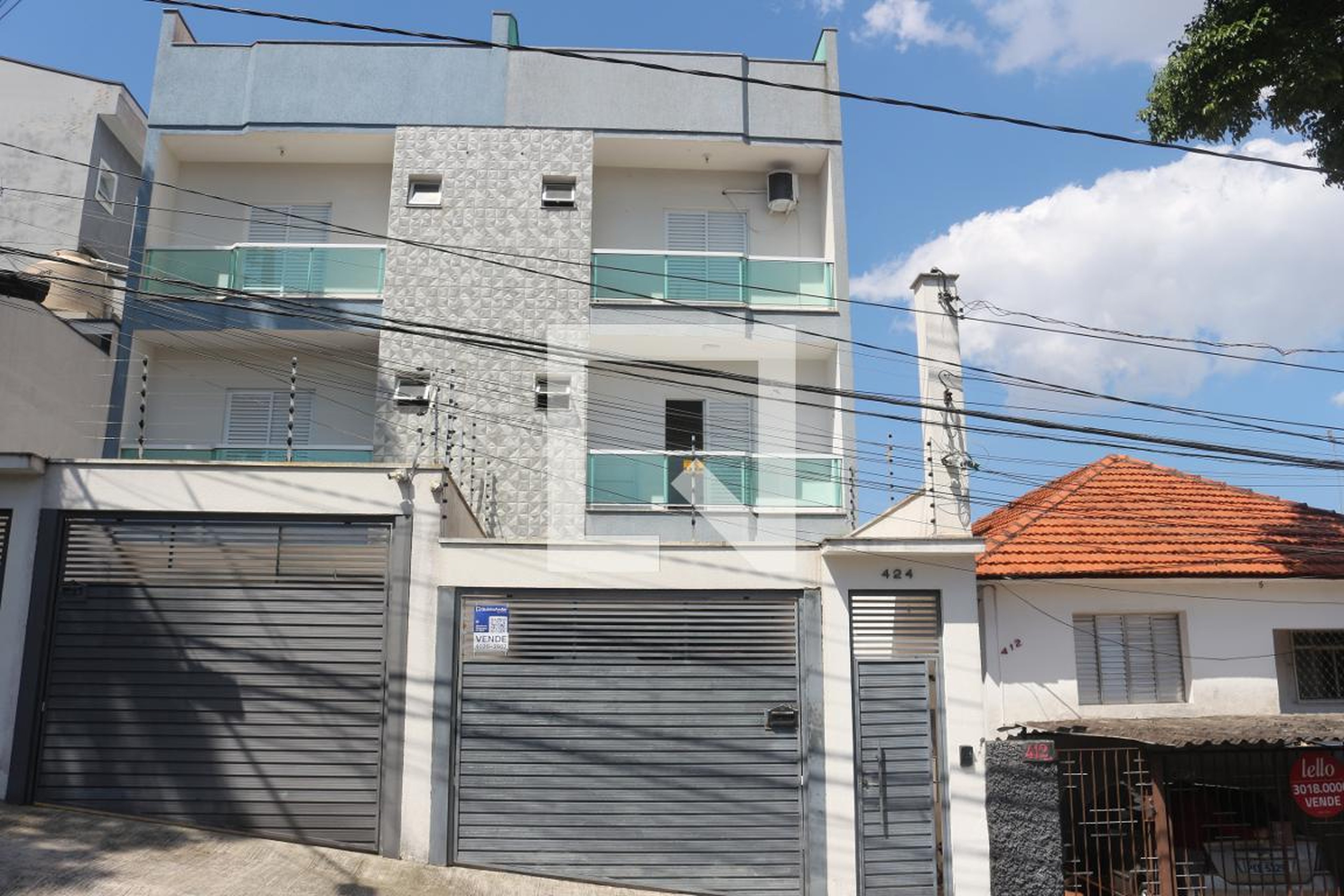 Fachada Condomínio em Rua Abernesia, 424