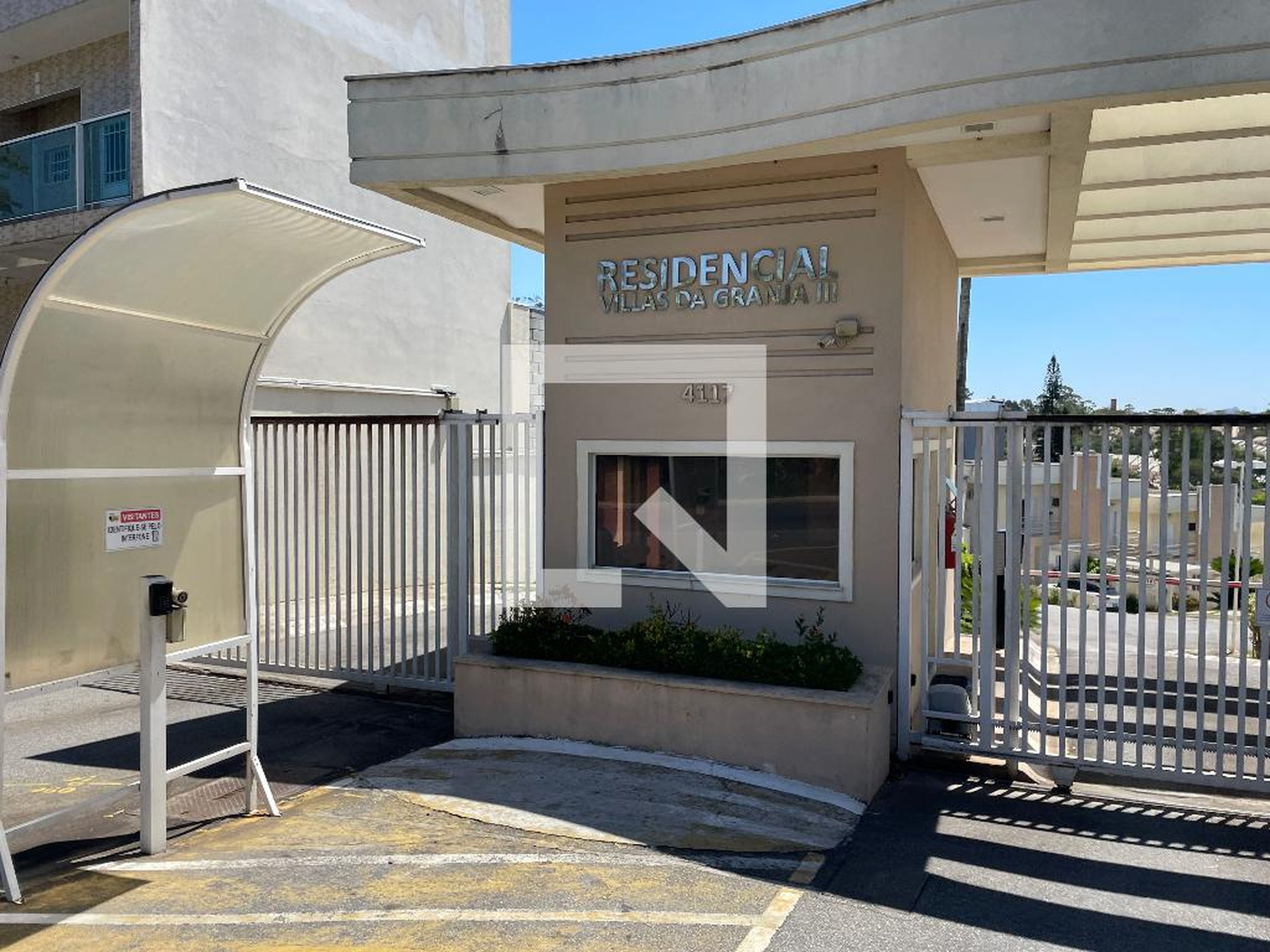 Fachada do Condomínio Condomínio Vila da Granja 3