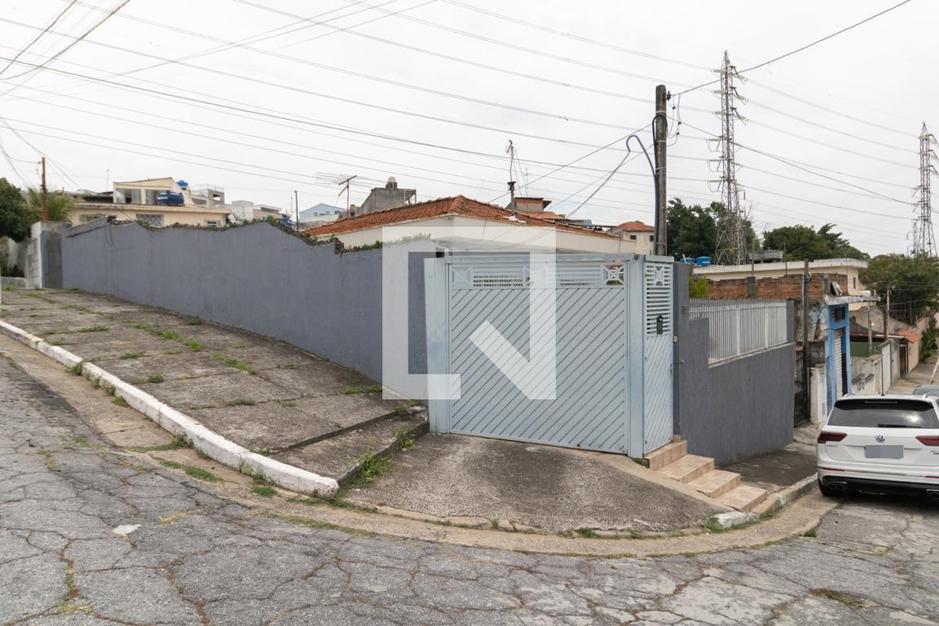 Fachada Condomínio Casa Fundos