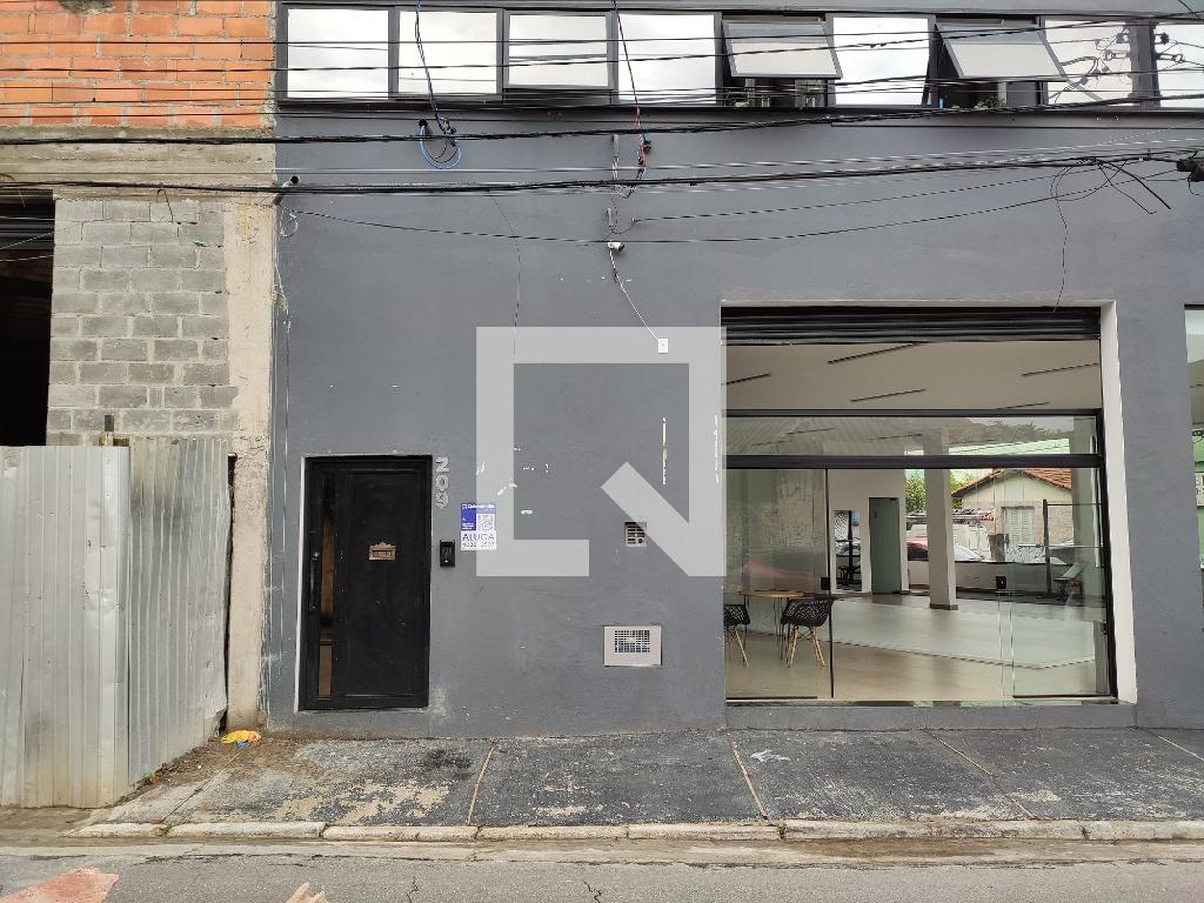 Fachada Condomínio em Rua Washington Luís, 209