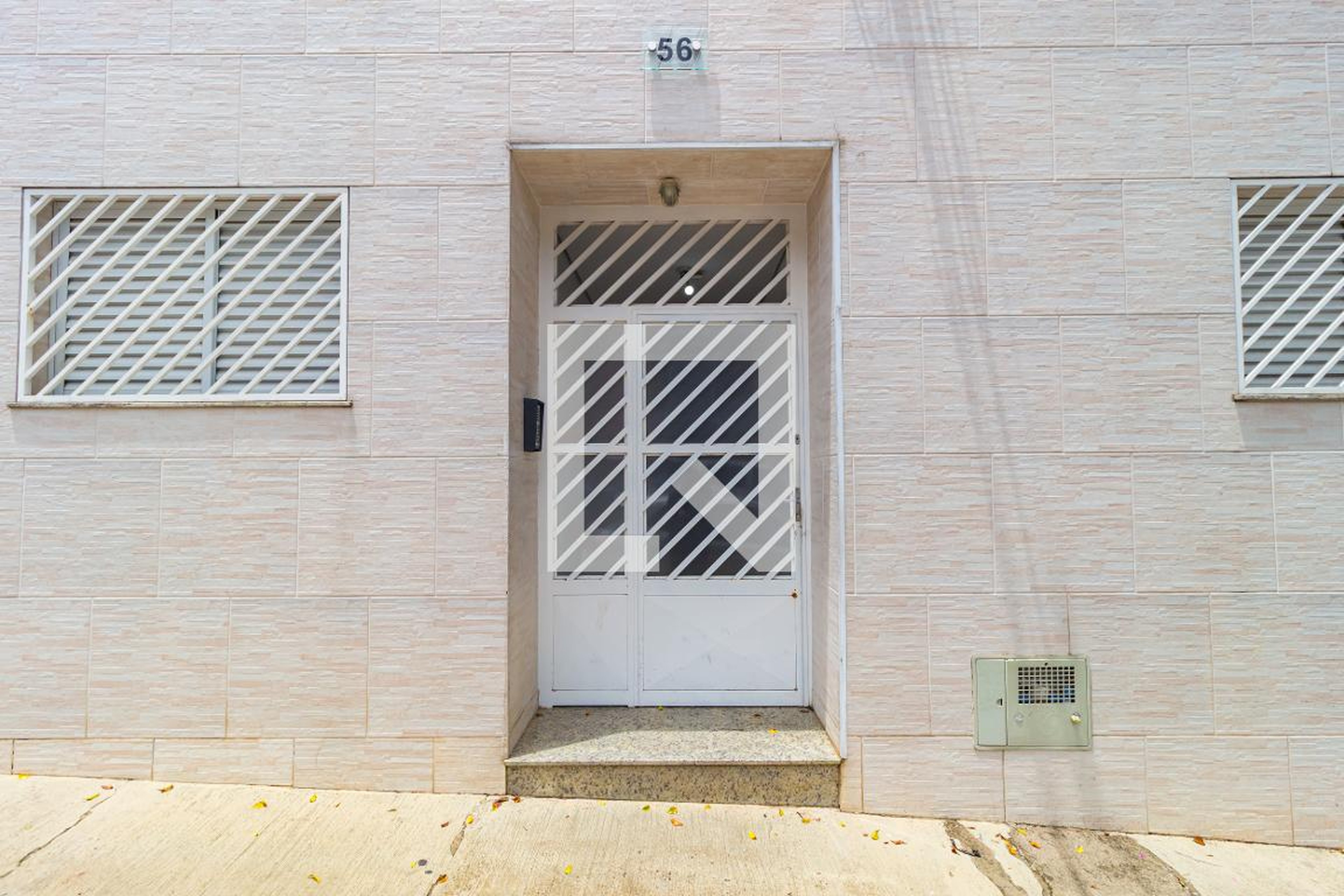 Fachada Condomínio em Rua Ezequiel Ramos, 56