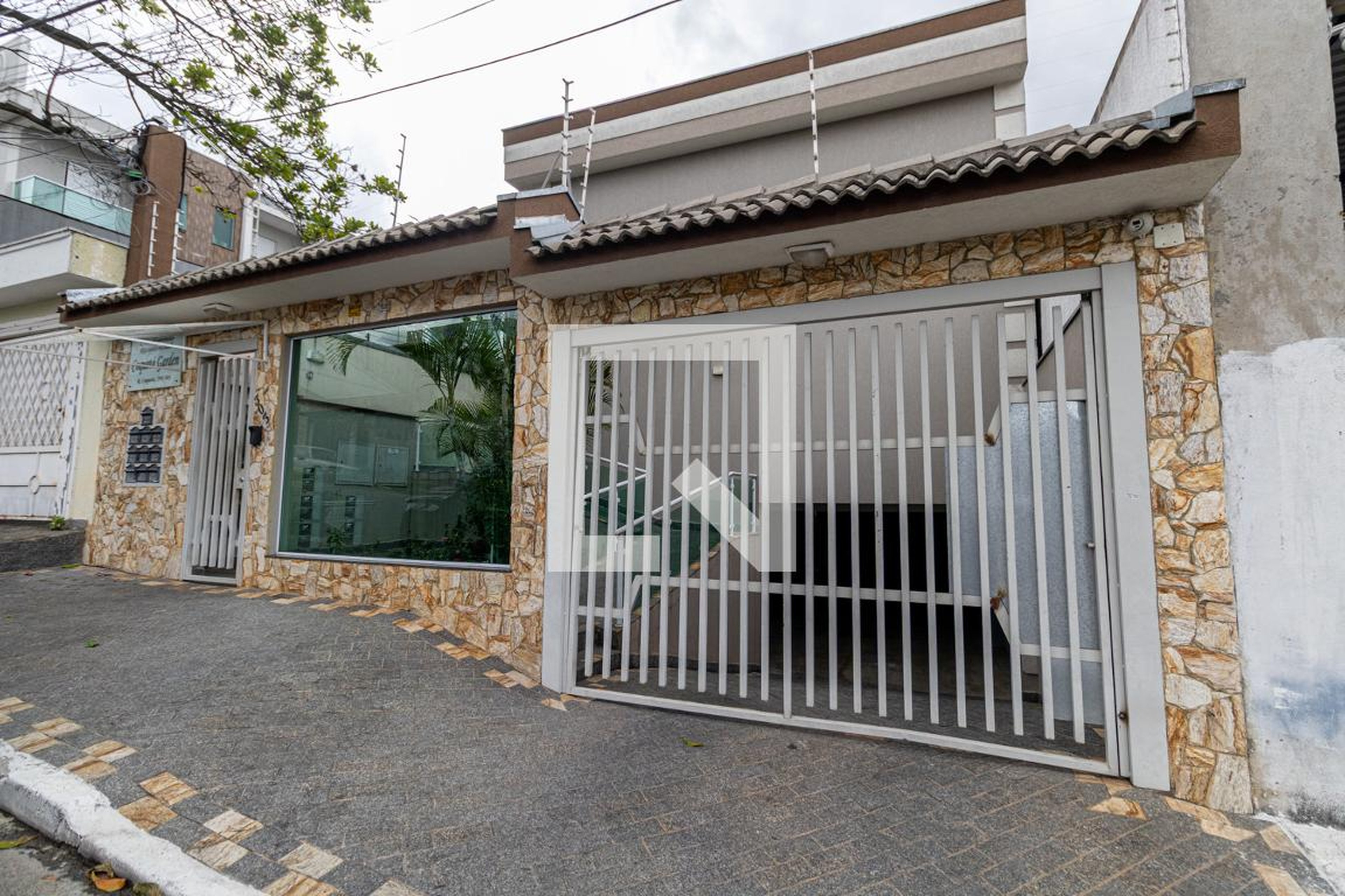 Fachada Condomínio em Rua Coquetá, 303