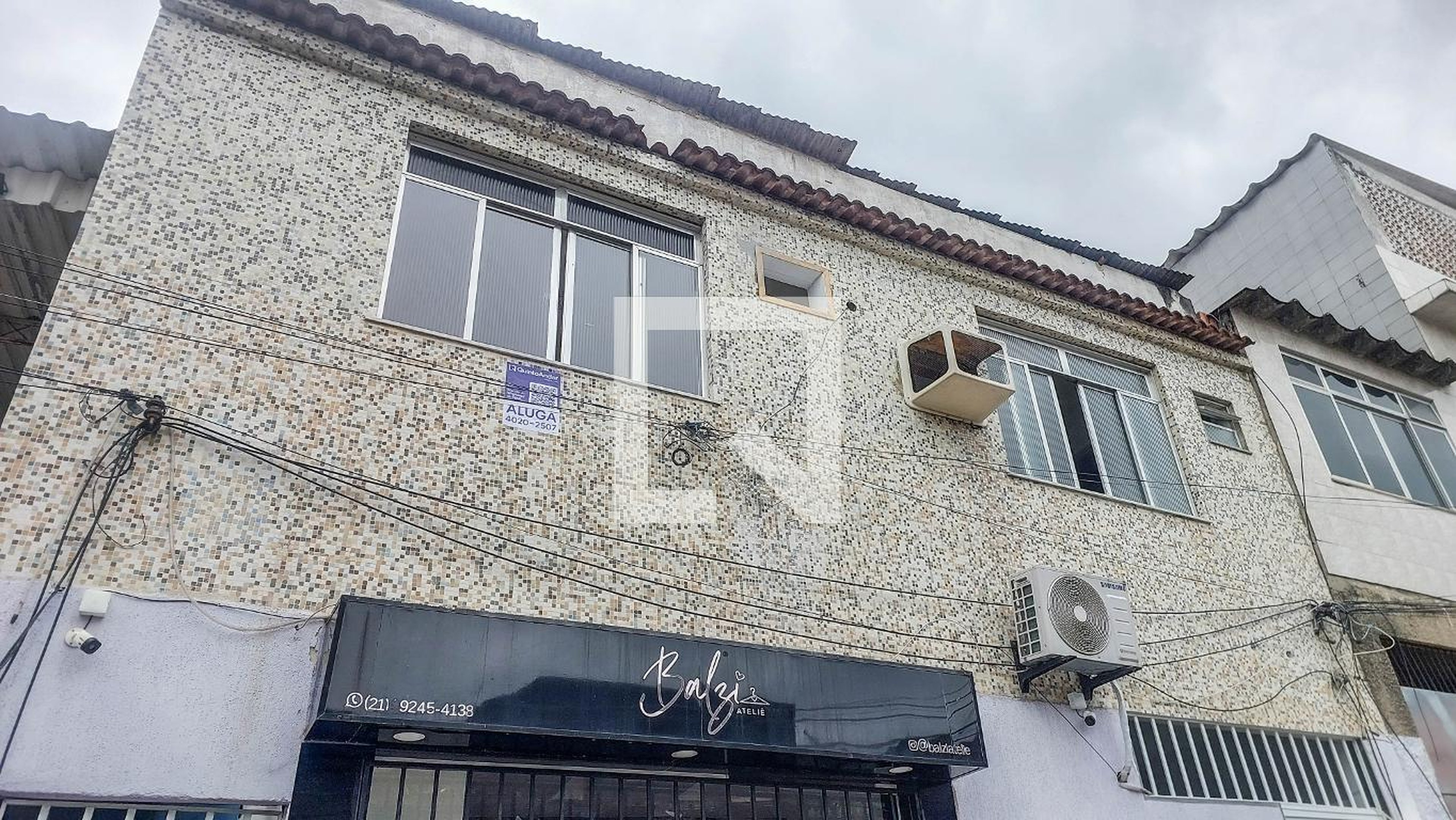 Fachada Condomínio em Rua São Cosme e São Damião, 24