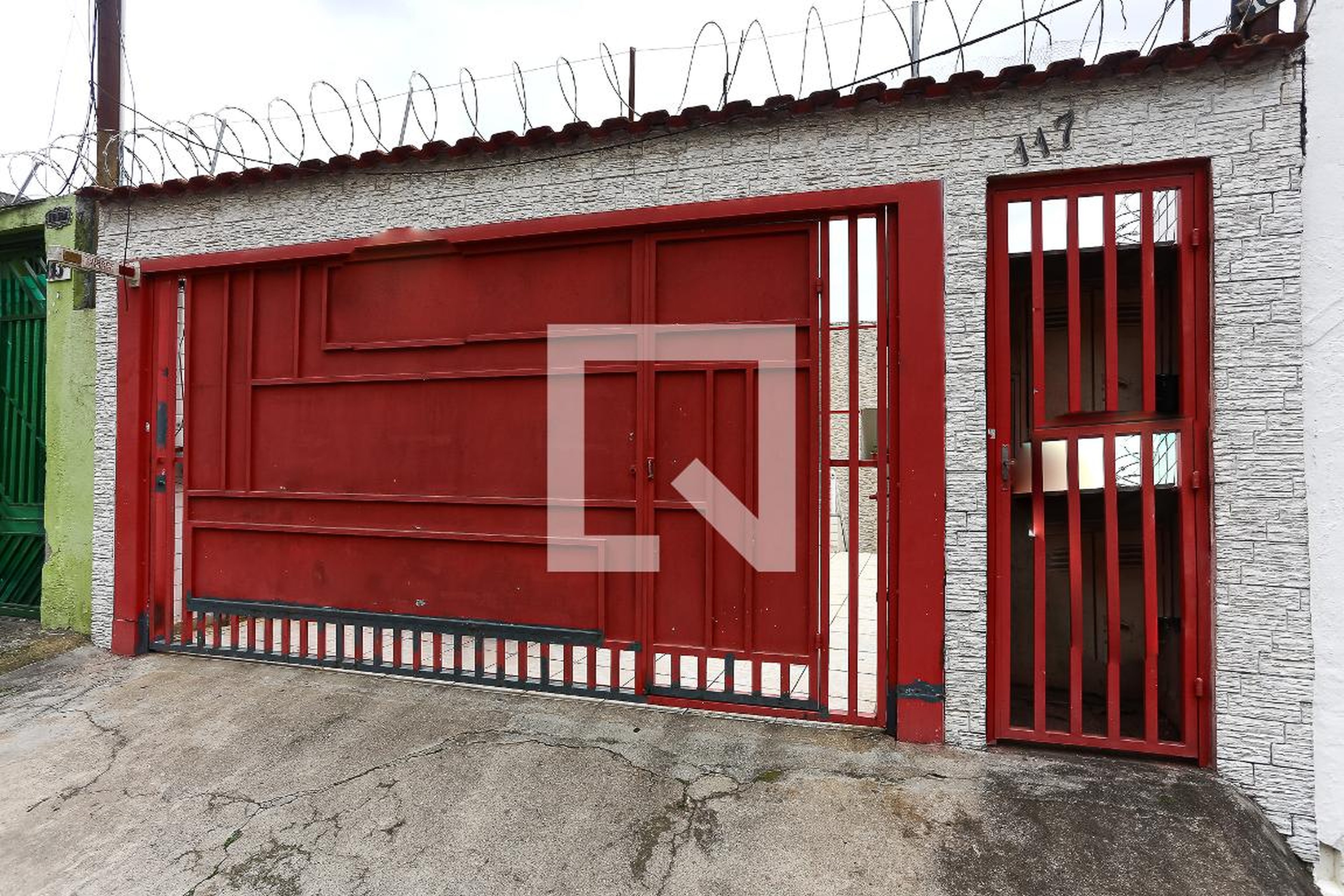 Fachada Condomínio em Rua Raul de Freitas, 117