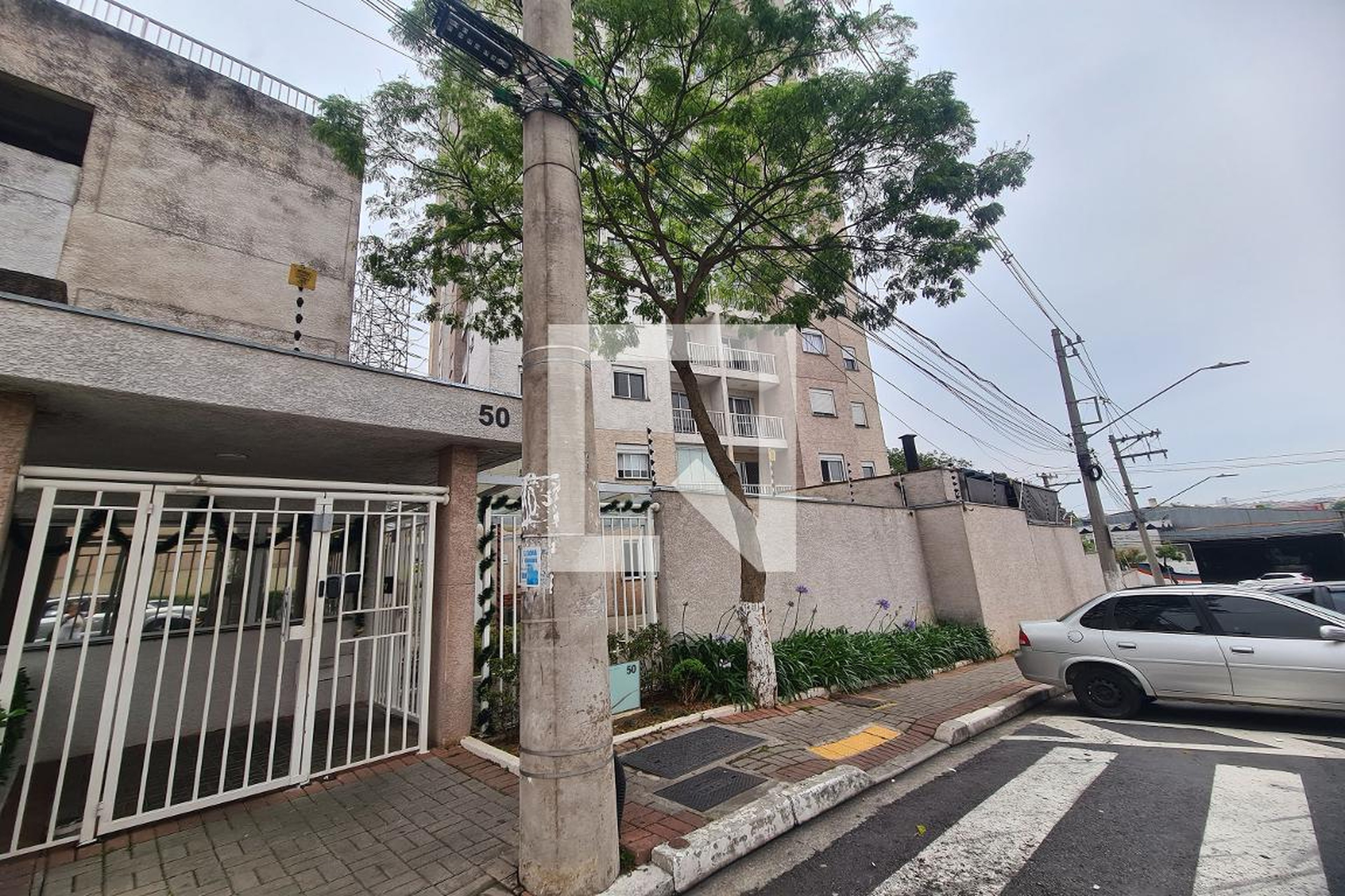 Fachada Condomínio New in Spot