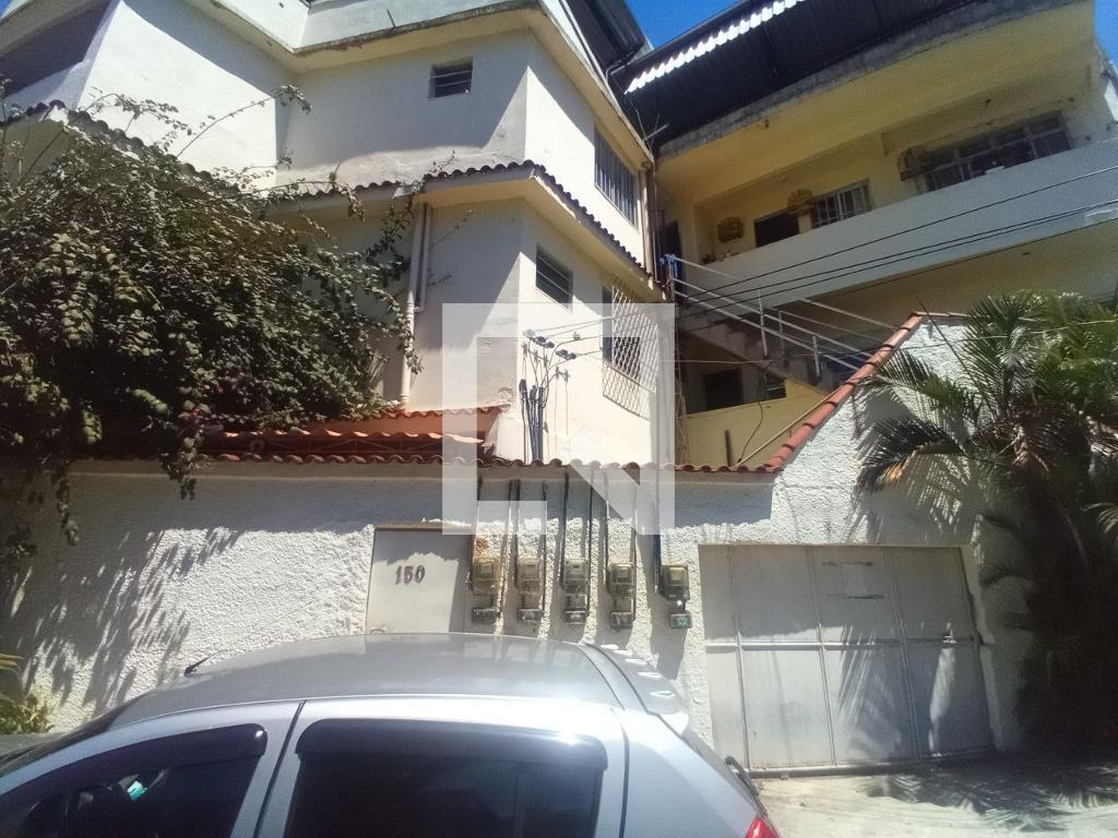 Fachada Condomínio em Rua Andrade Pinto, 150