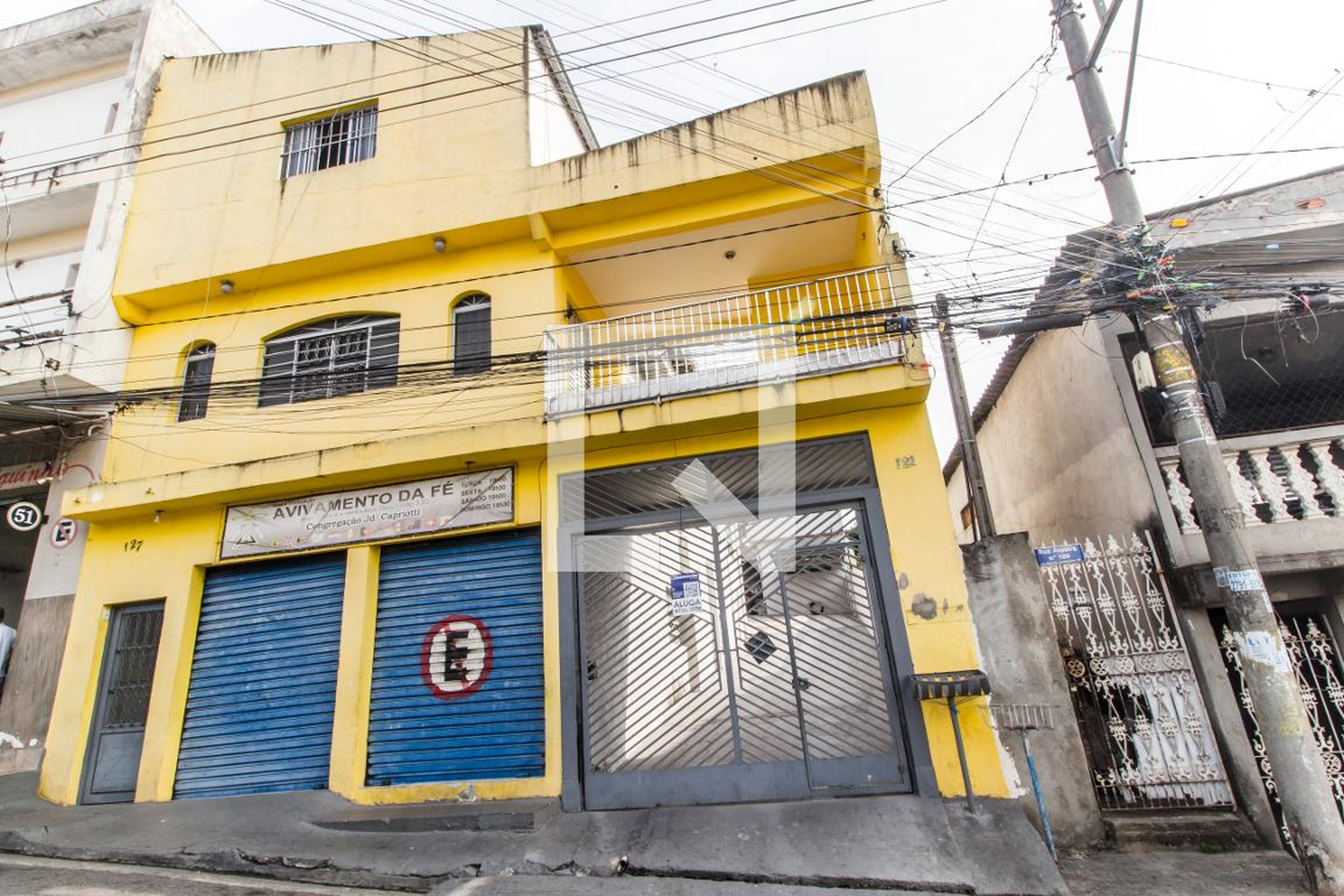 Fachada Condomínio em Rua Aspásia, 127