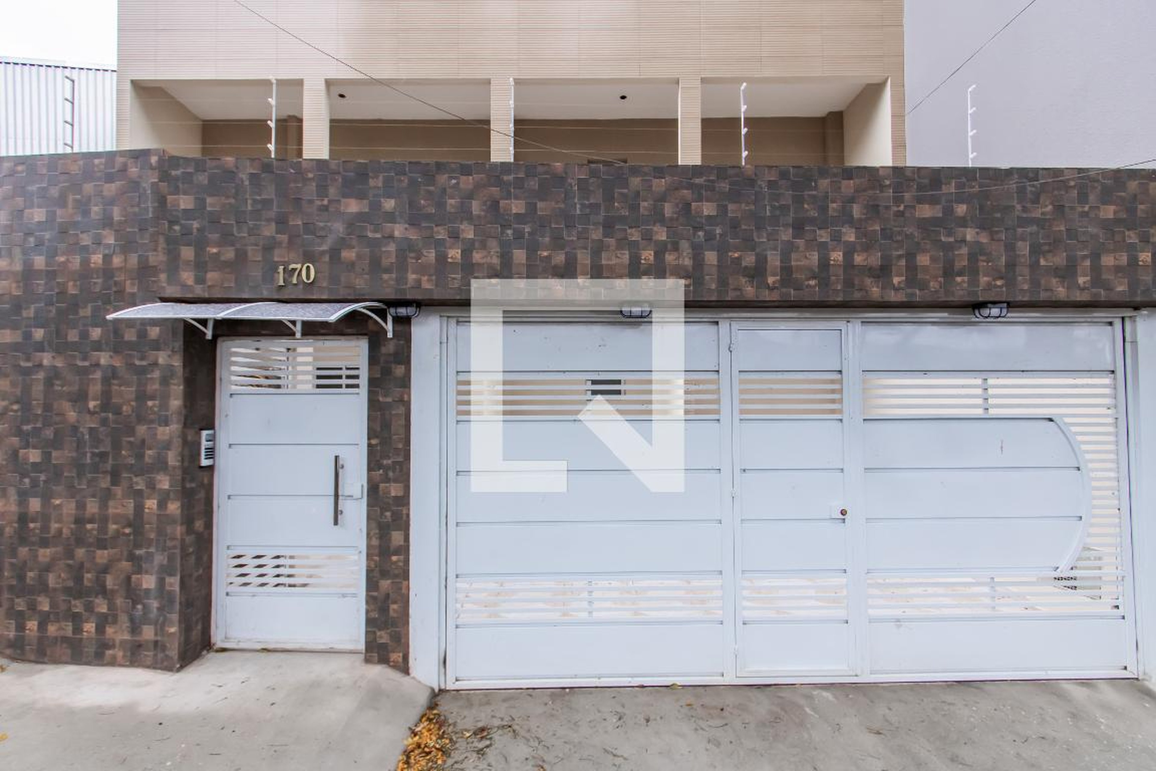 Fachada Condomínio em Rua Licânia, 170