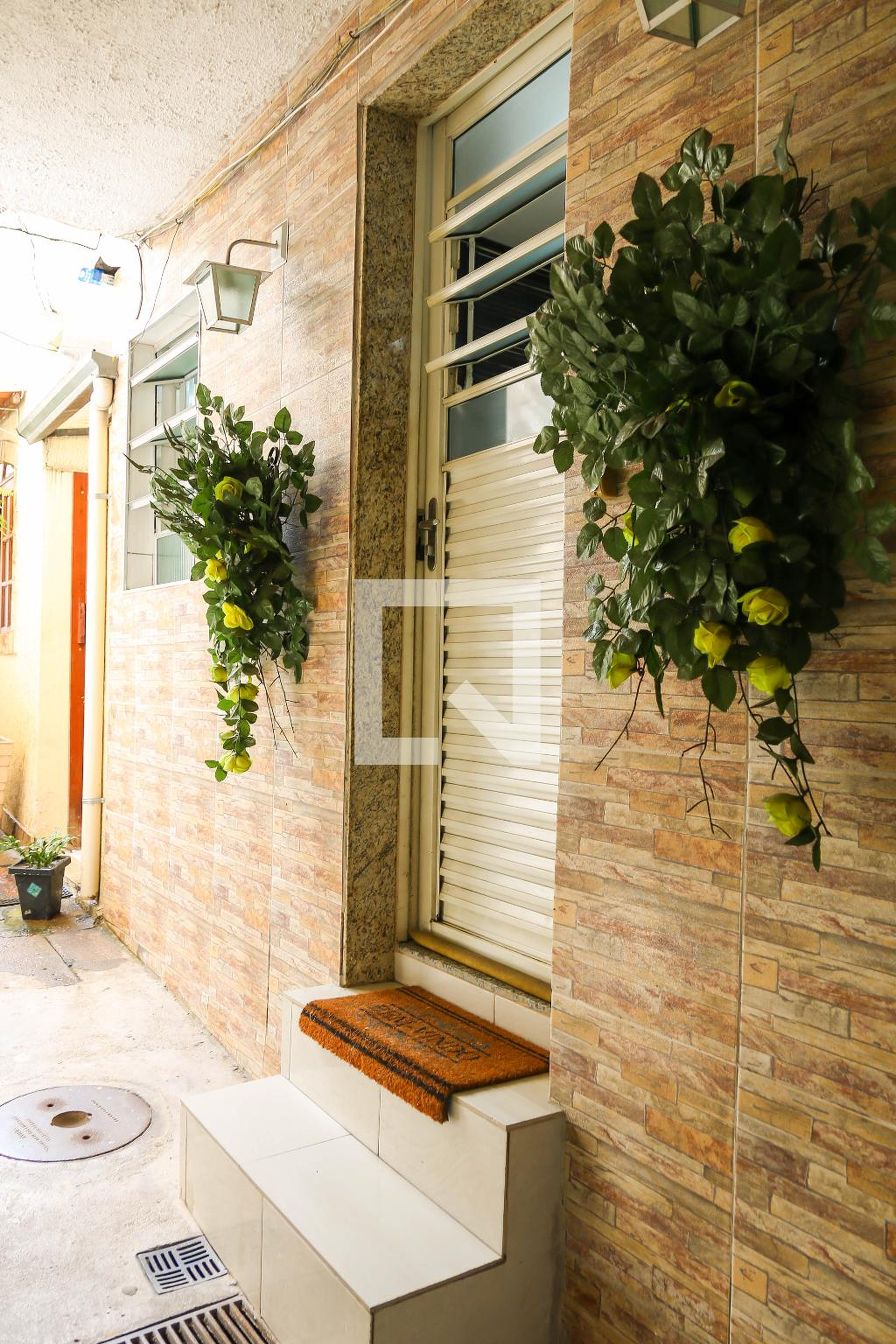 Entrada Condomínio em Rua Bamboré, 34