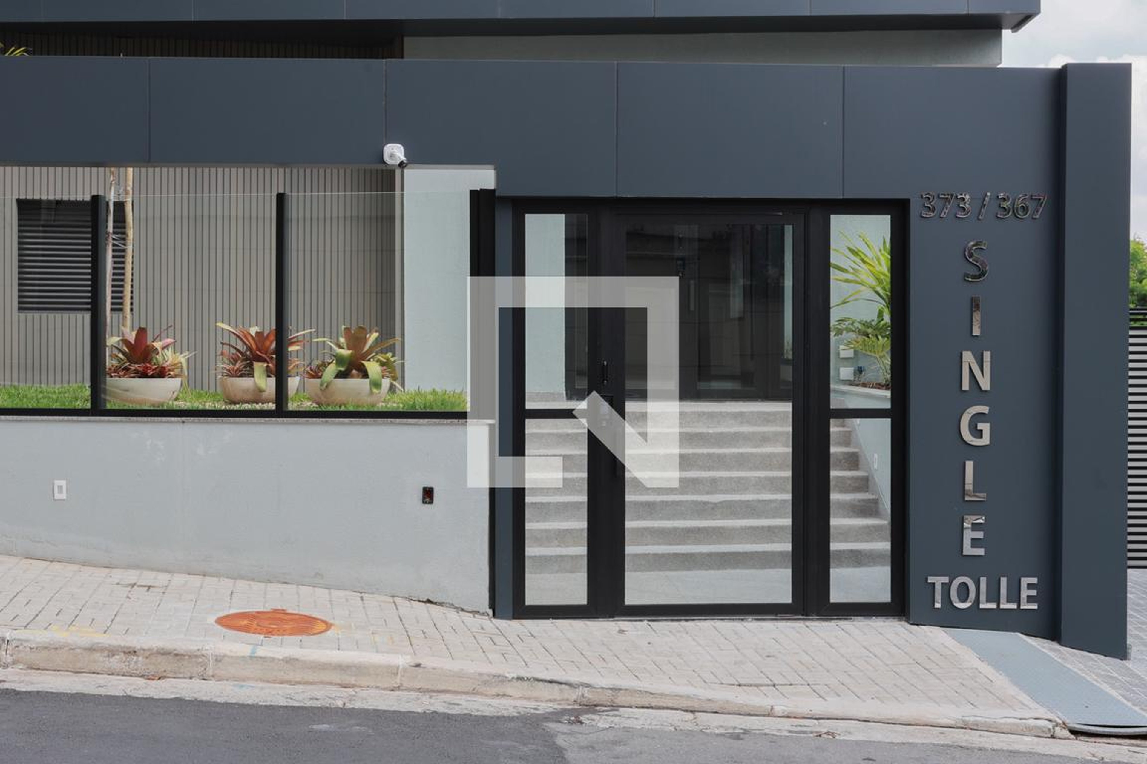 Fachada do condomínio Condomínio Single Tolle