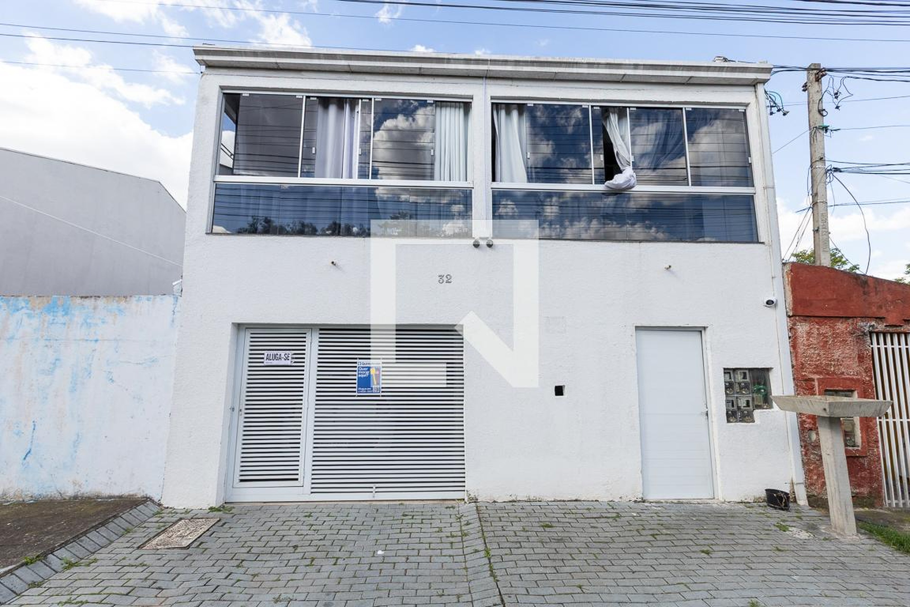 Fachada Condomínio em Rua Maria Medeiros Damas, 32