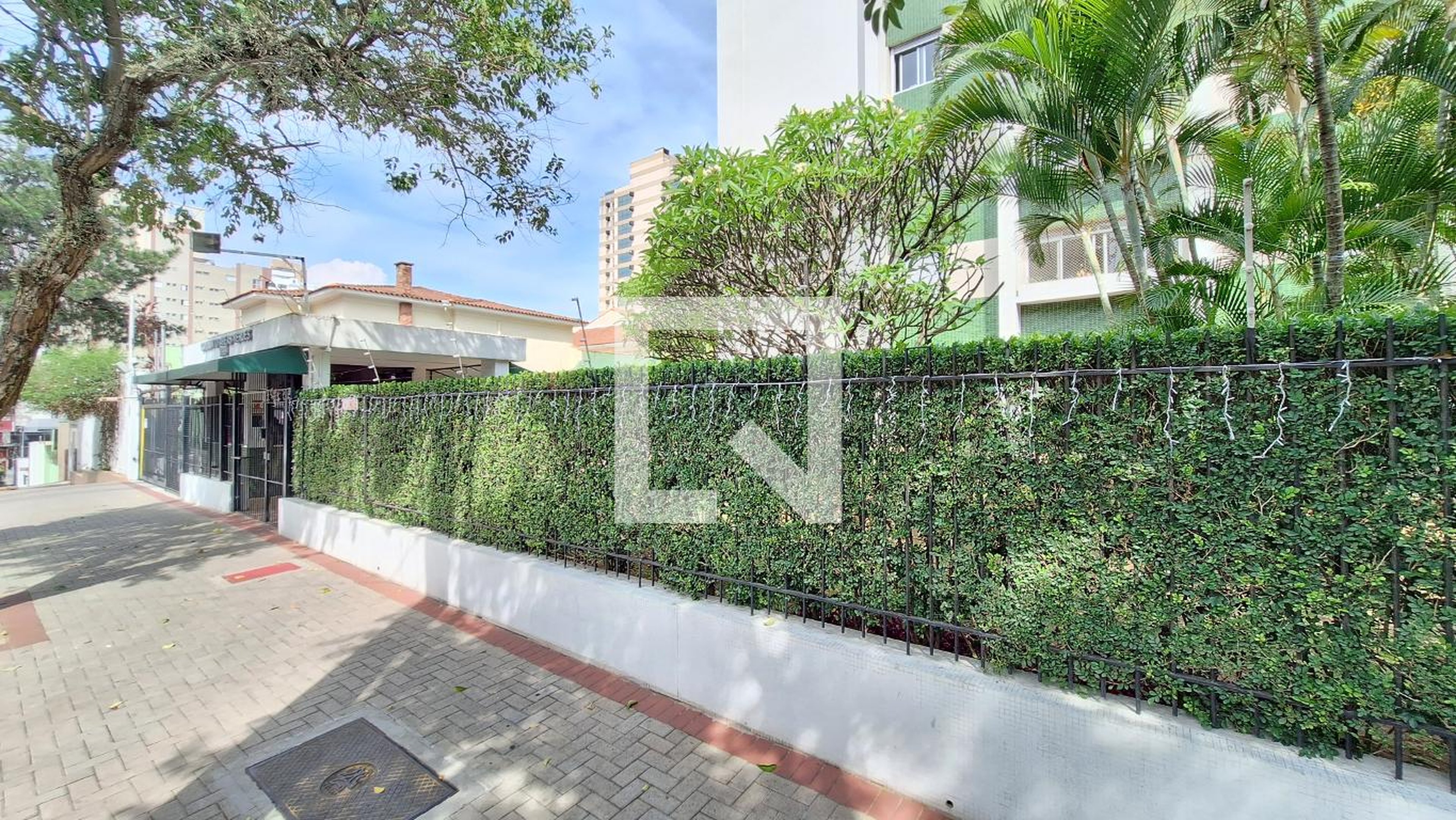 Fachada Condomínio Conjunto áreas verdes - Edifício Acacias