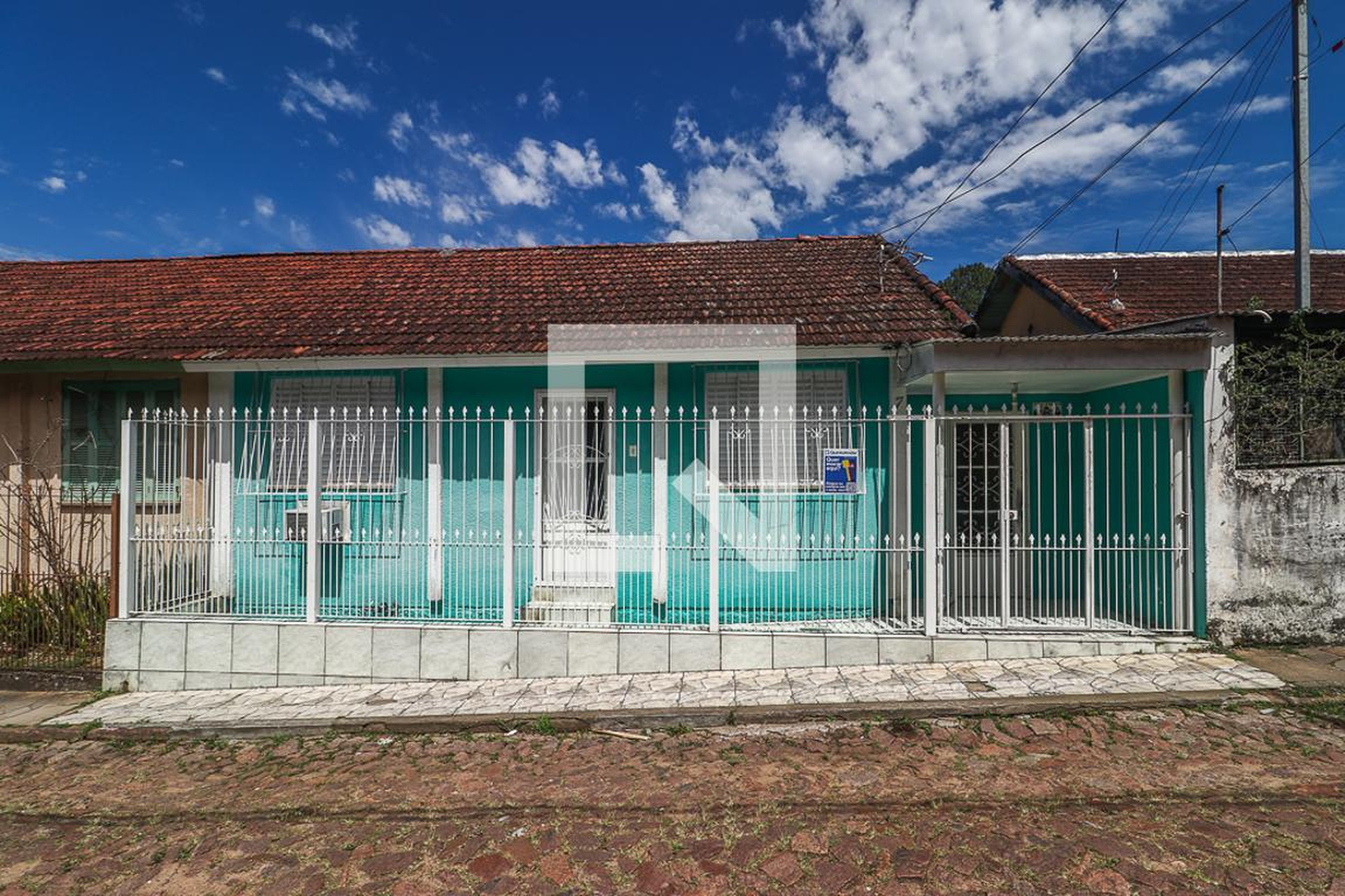 Fachada Condomínio em Via Onze, 7