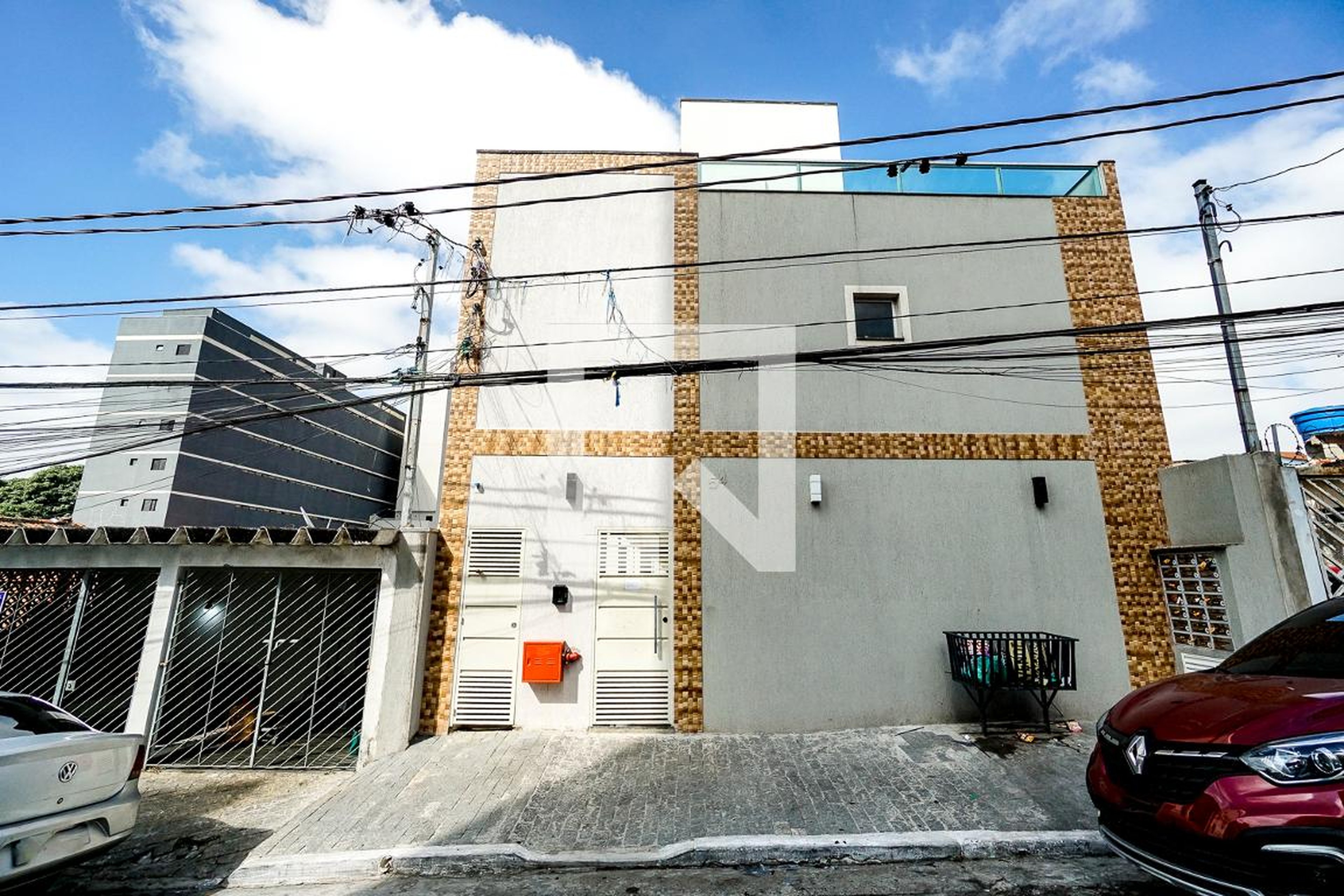 Fachada Condomínio em Rua Aquirás, 54a