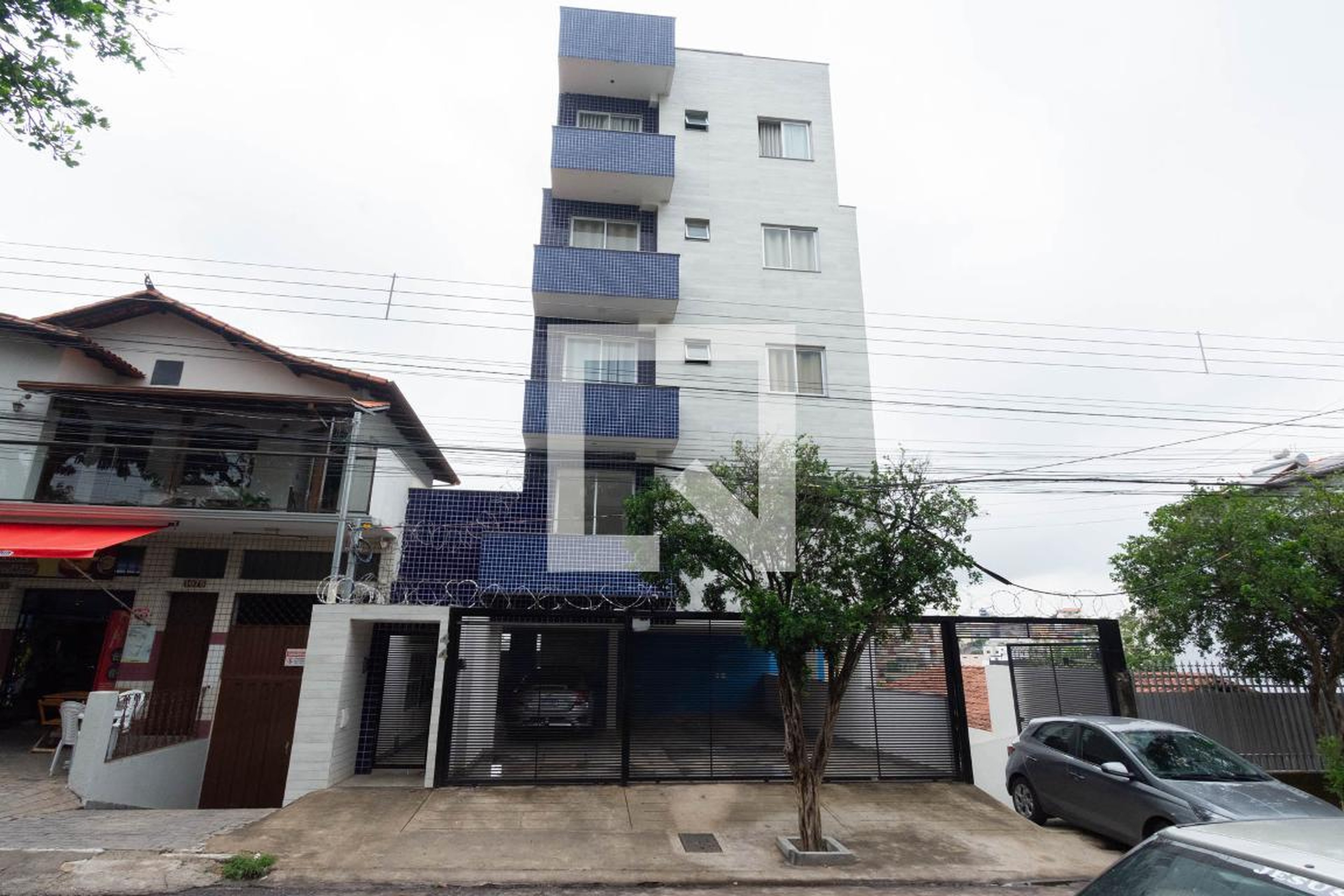 Fachada Condomínio em Rua Tinguassu, 44