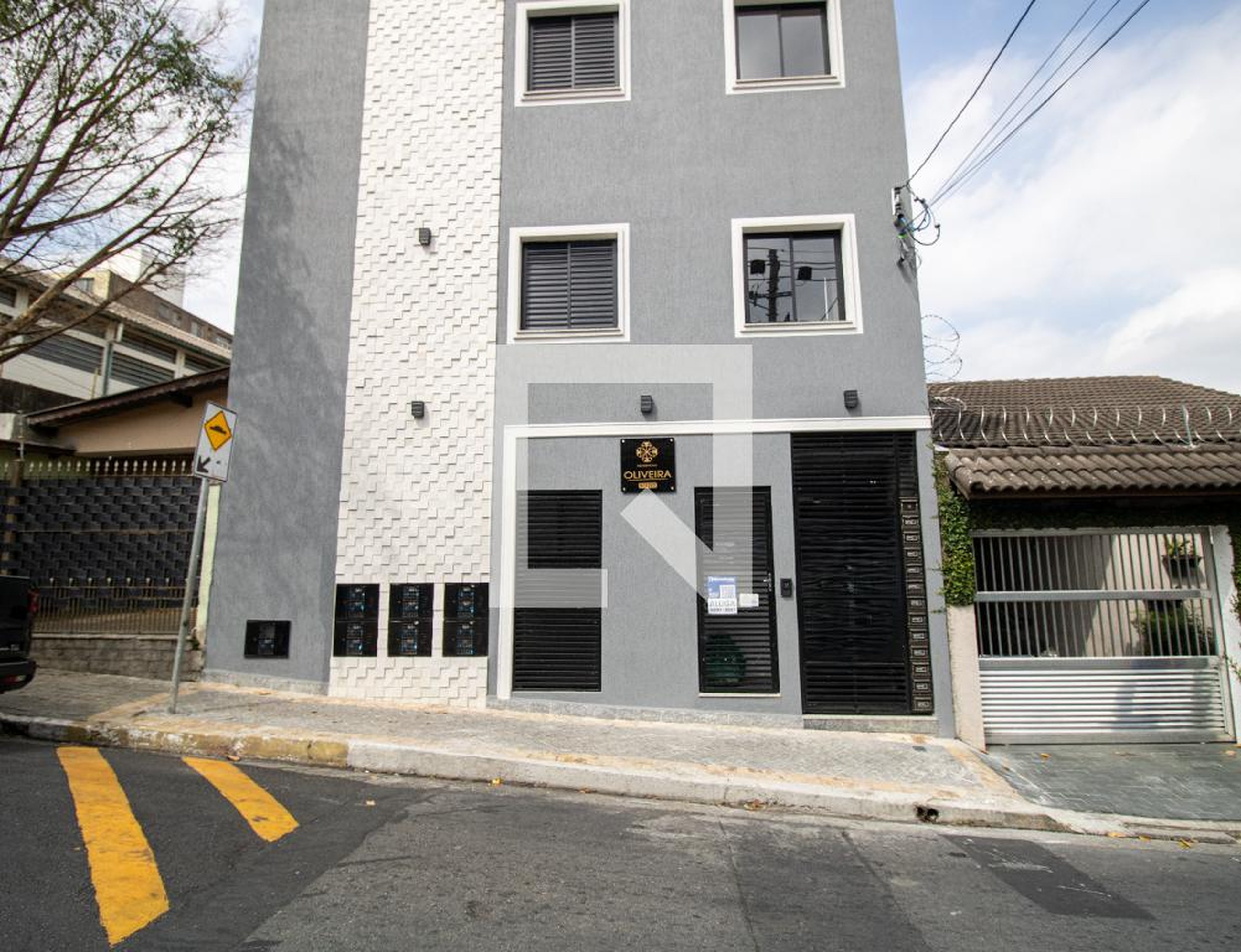 Fachada Condomínio em Rua Tanque Velho, 2292