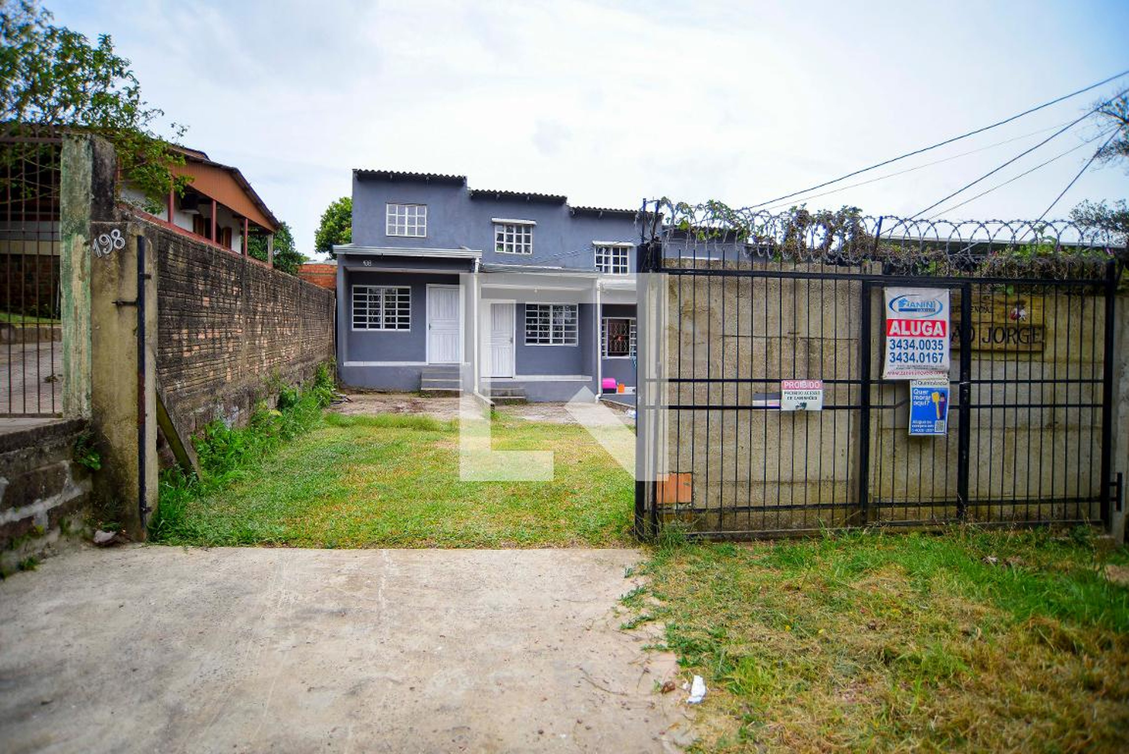 Fachada Condomínio em Rua Leopoldo Migues, 198