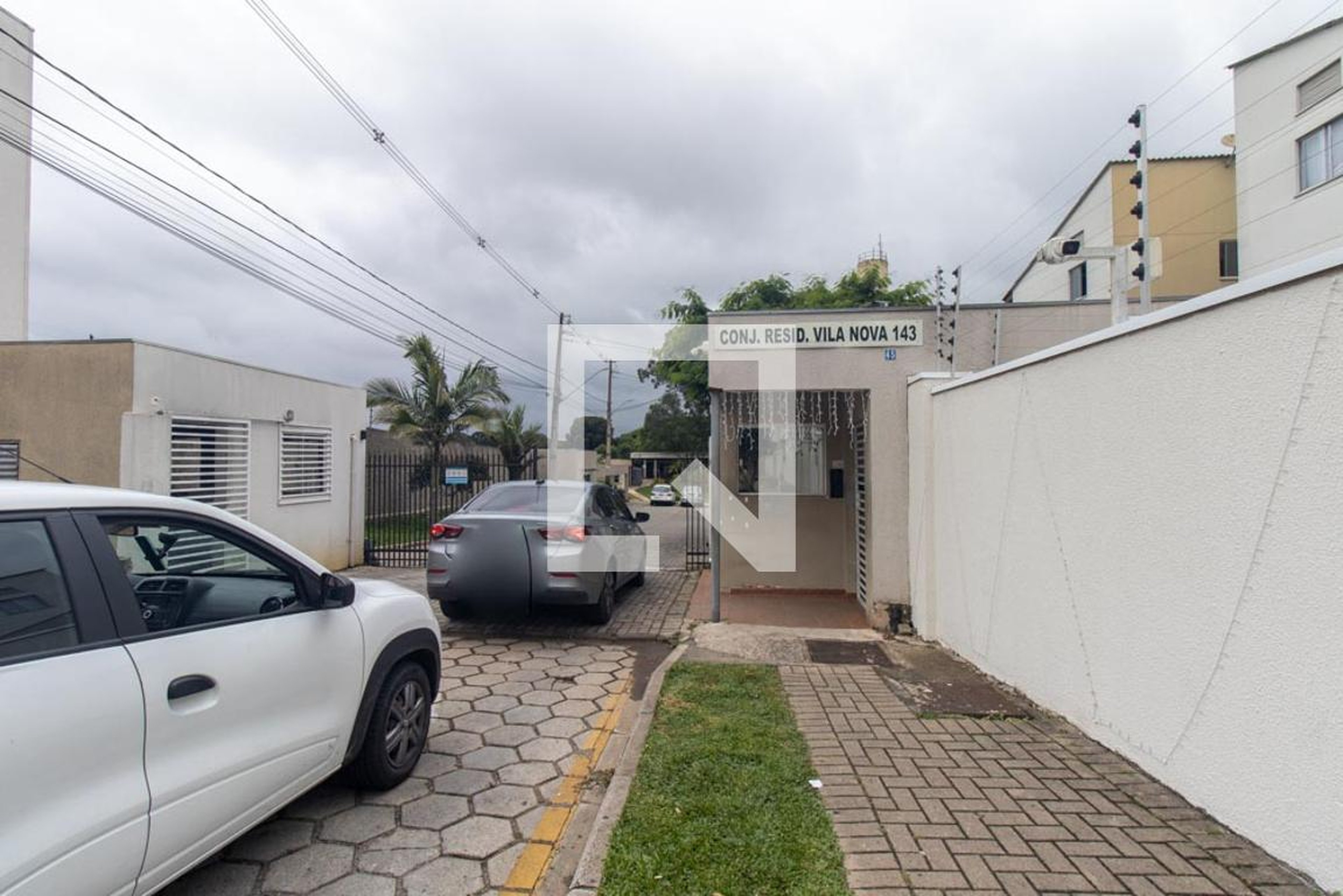 Fachada do Condomínio Condomínio Vila Nova